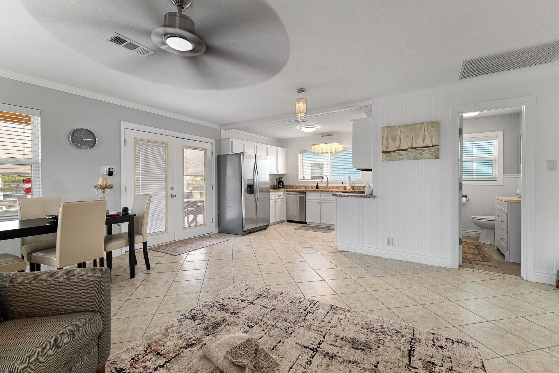 66 Tarpon Street, Bayou Vista, TX 77563 Open-concept view connecting the kitchen, dining and living spaces for easy entertaining.