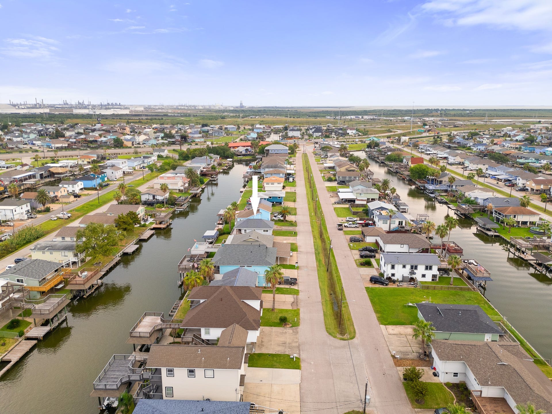 66 Tarpon Street, Bayou Vista, TX 77563 Aerial view highlighting the homes position along the canal.