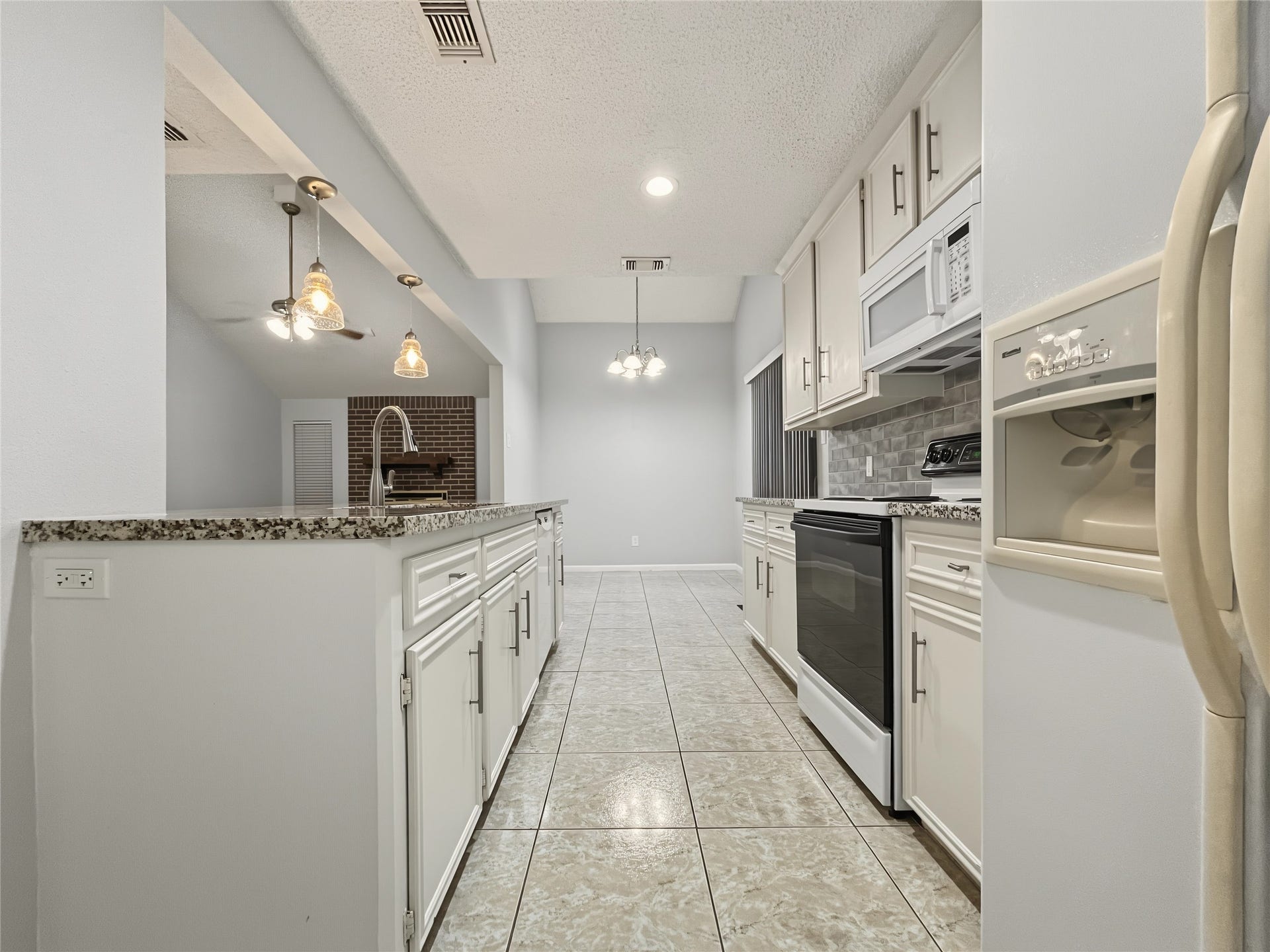 View from the laundry room to the kitchen.