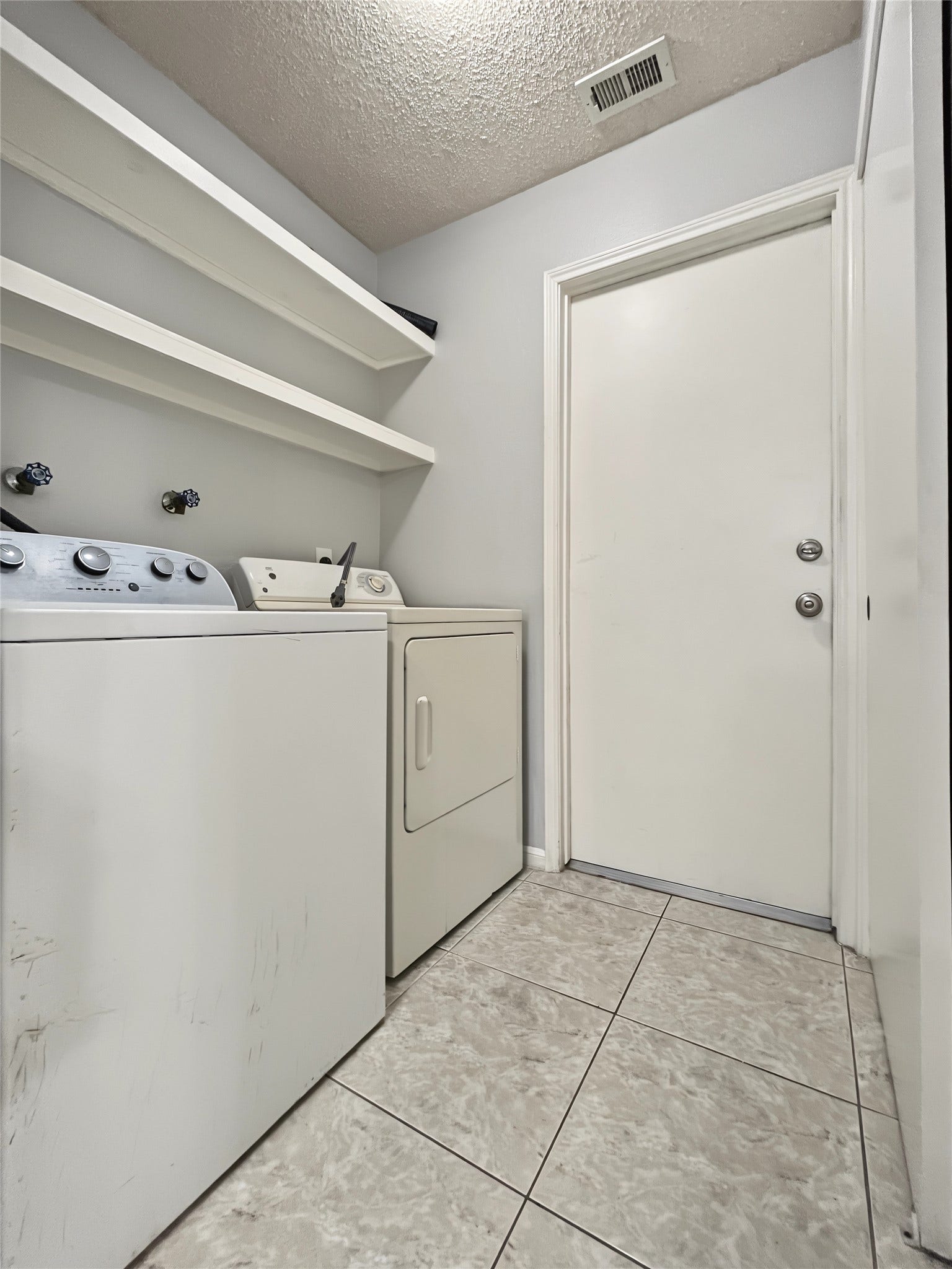 View of the laundry room in the house.