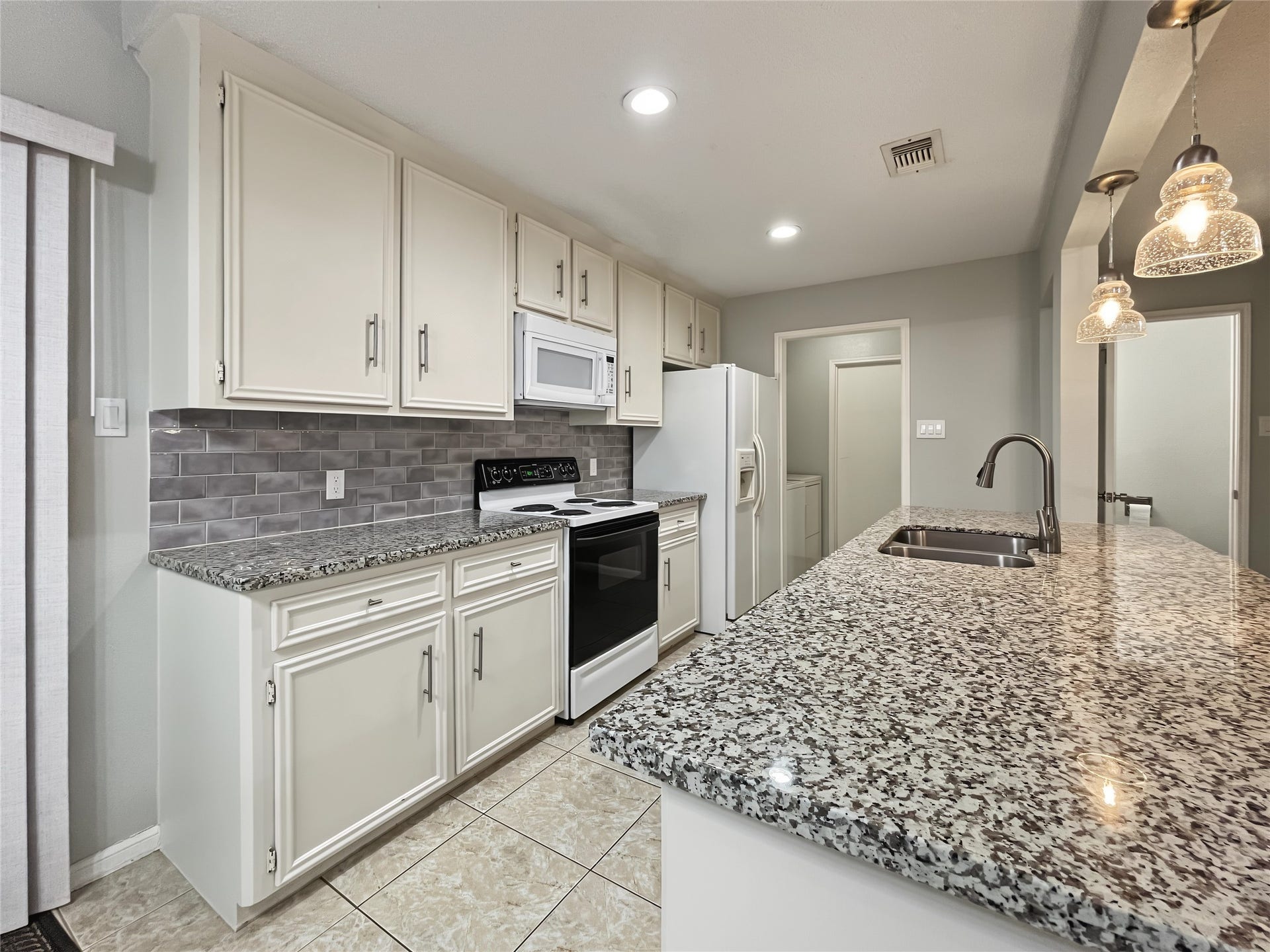 Another view of the kitchen