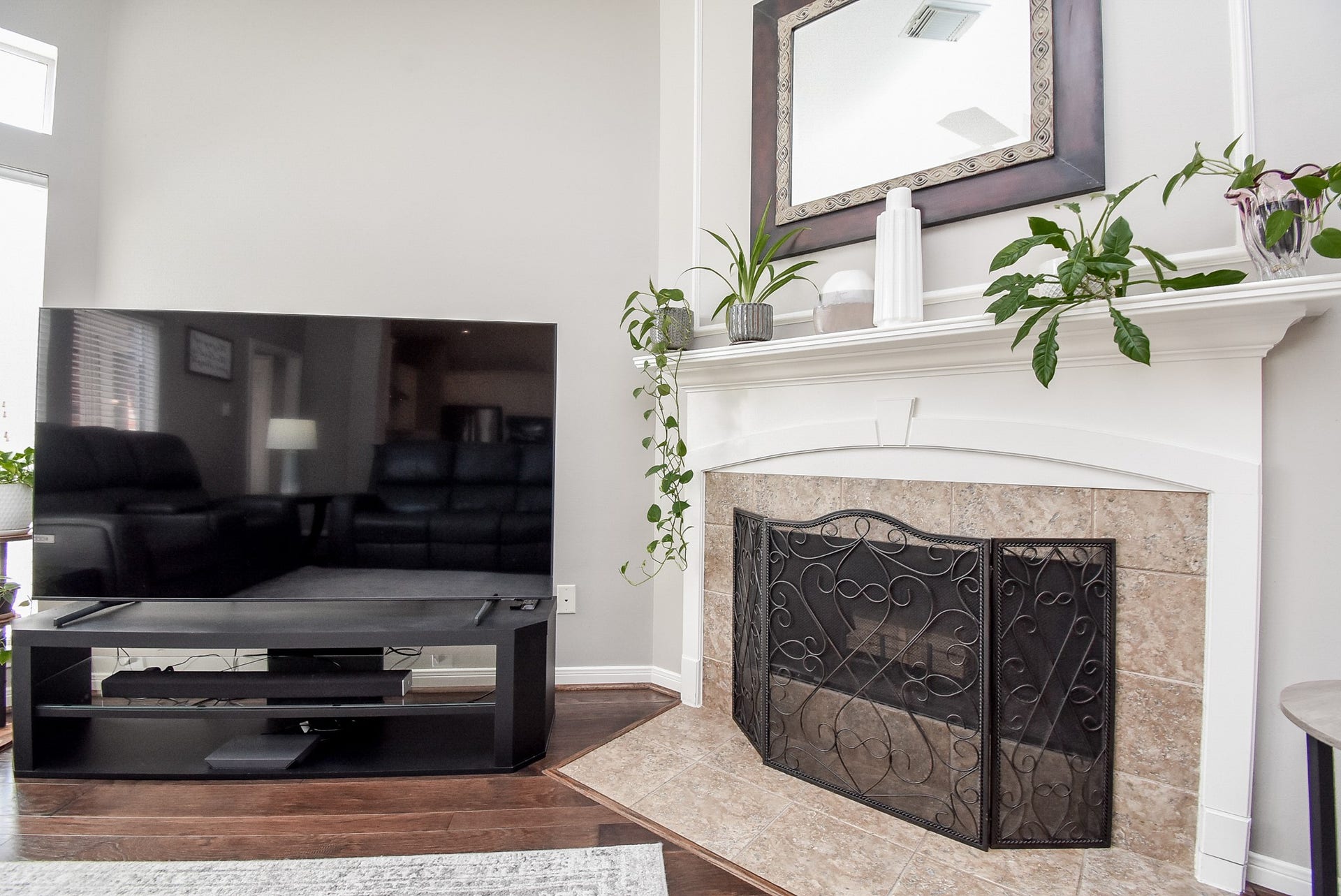 7218 Fall Creek Bend, Humble, TX 77396 The cozy fireplace features tile surround and ornate classic wood painted mantle.