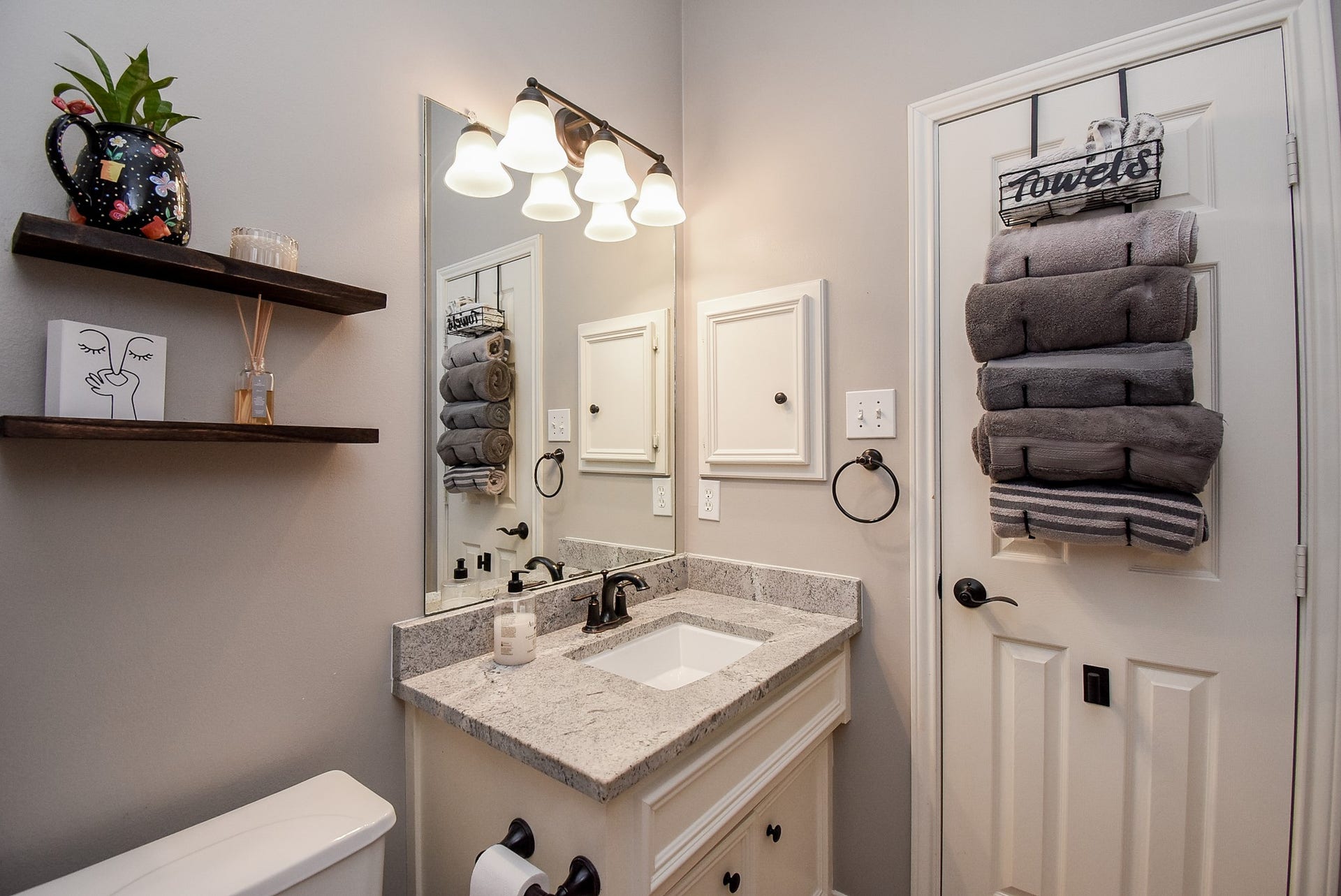 7218 Fall Creek Bend, Humble, TX 77396 Granite bathroom counter with recessed medicine cabinet.