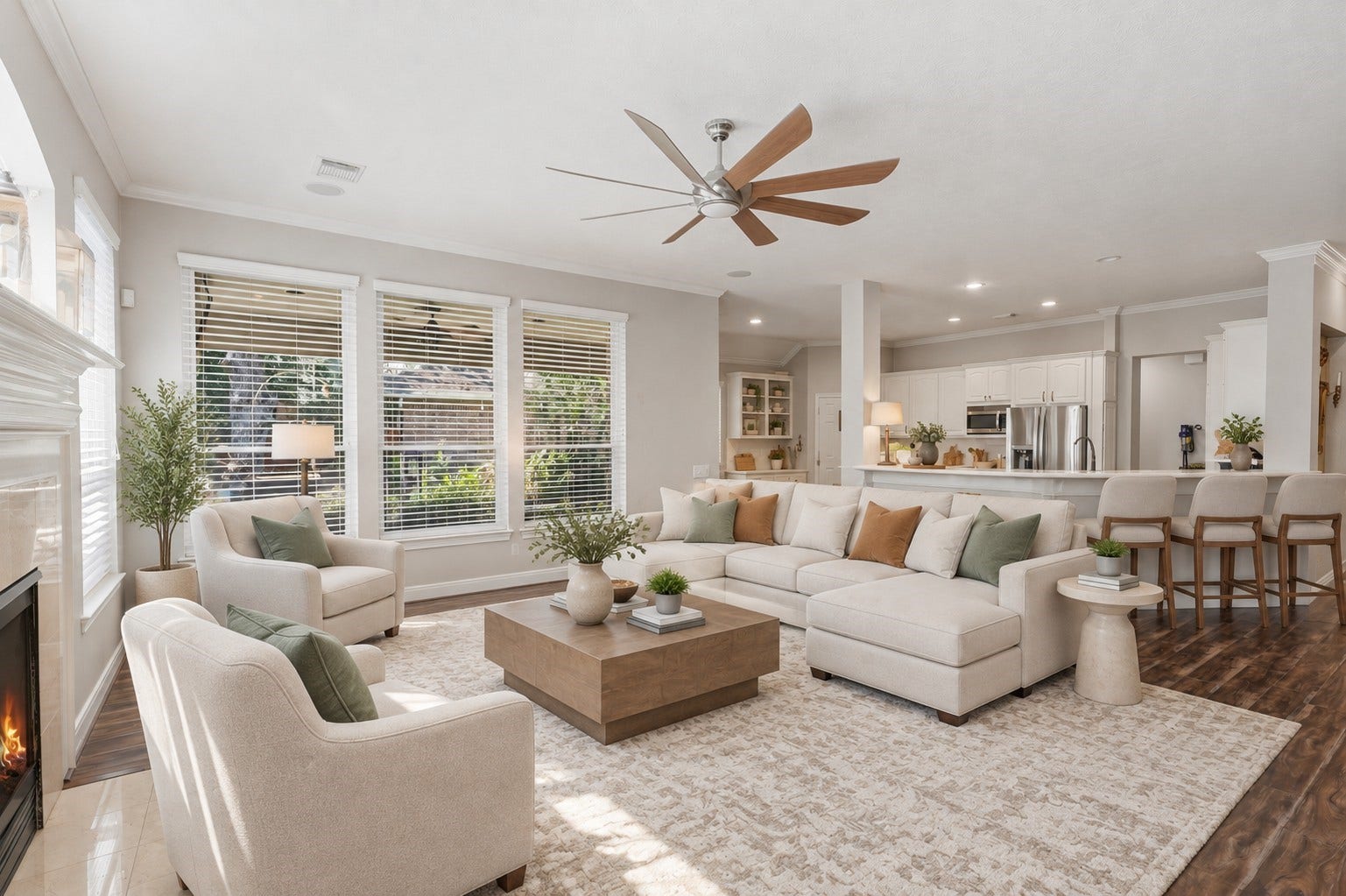 A spacious living room offers abundant natural light, high ceilings, and an easy flow into the kitchen and breakfast area.**Virtually staged
