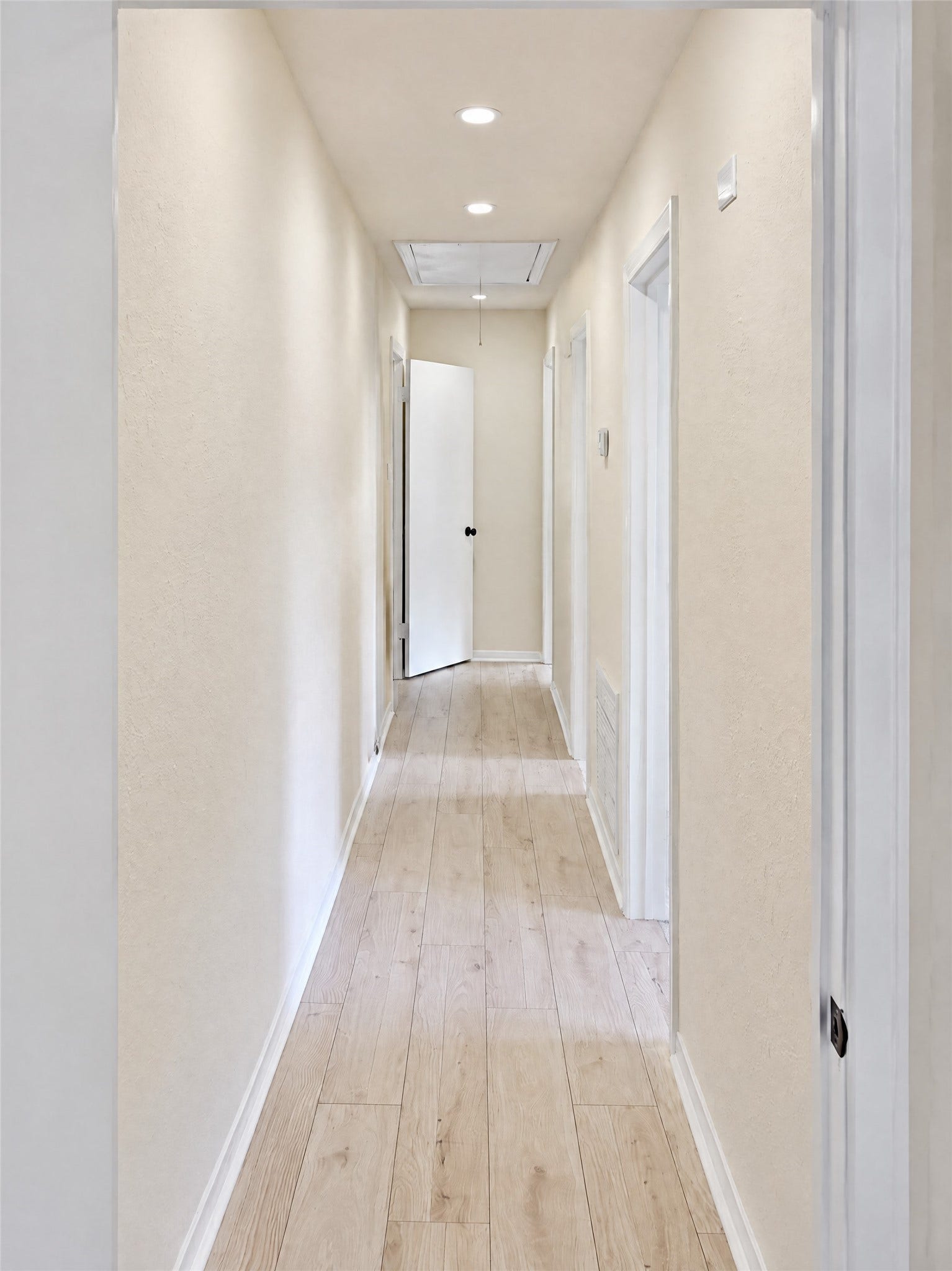 16411 Amcreek Road, Houston, TX 77068 Move down the wide, well-lit hallway that leads to the private bedroom wing, offering a thoughtful floor plan that separates restful retreats from the central entertainment hubs.