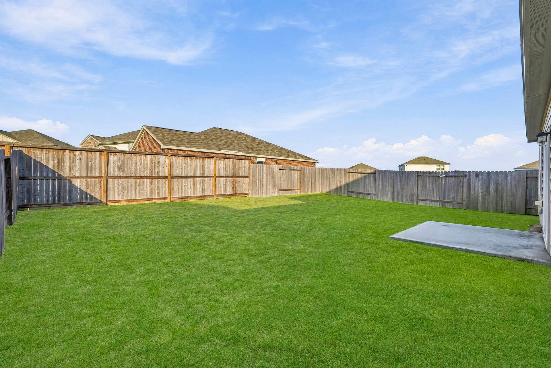 21547 Rolling Streams Drive, New Caney, TX 77357 With plenty of open space this outdoor area is perfect for enjoying sunny afternoons, hosting gatherings, or creating a personalized backyard oasis.