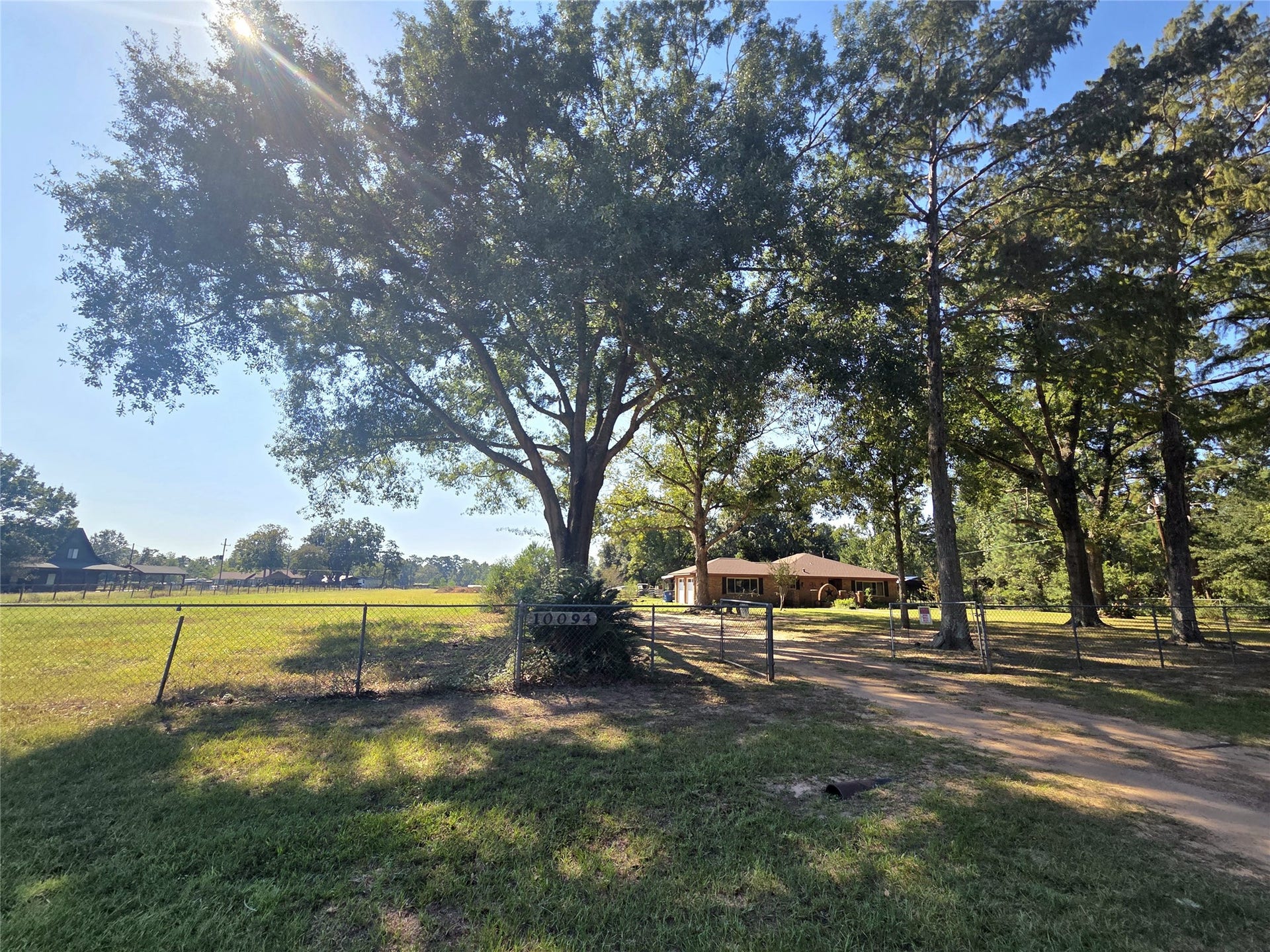 10094 Stidham Road, Conroe, TX 77302 Unrestricted acreage with tons of improvements!
