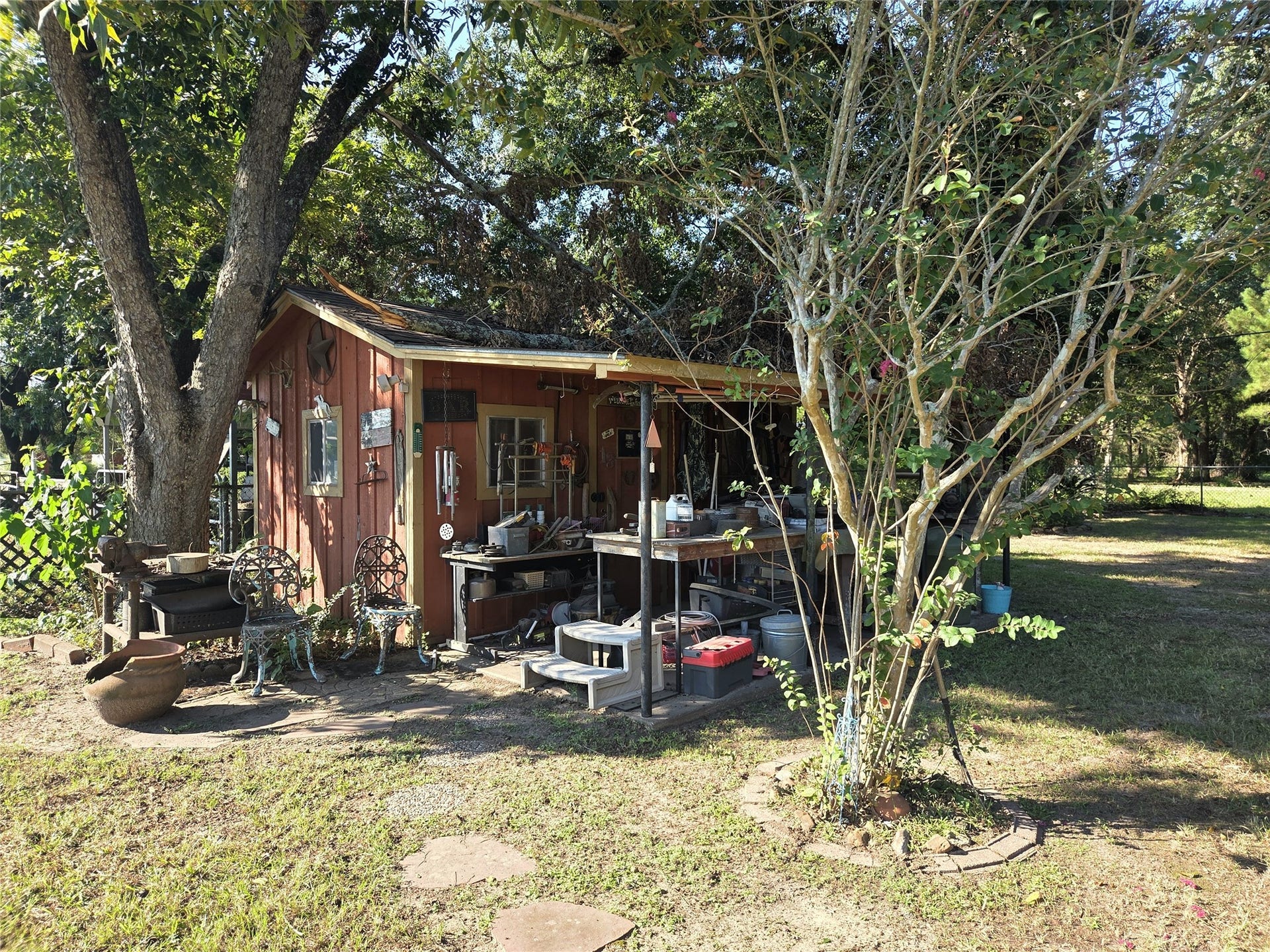 10094 Stidham Road, Conroe, TX 77302 Cute country-style wellhouse with workshop!