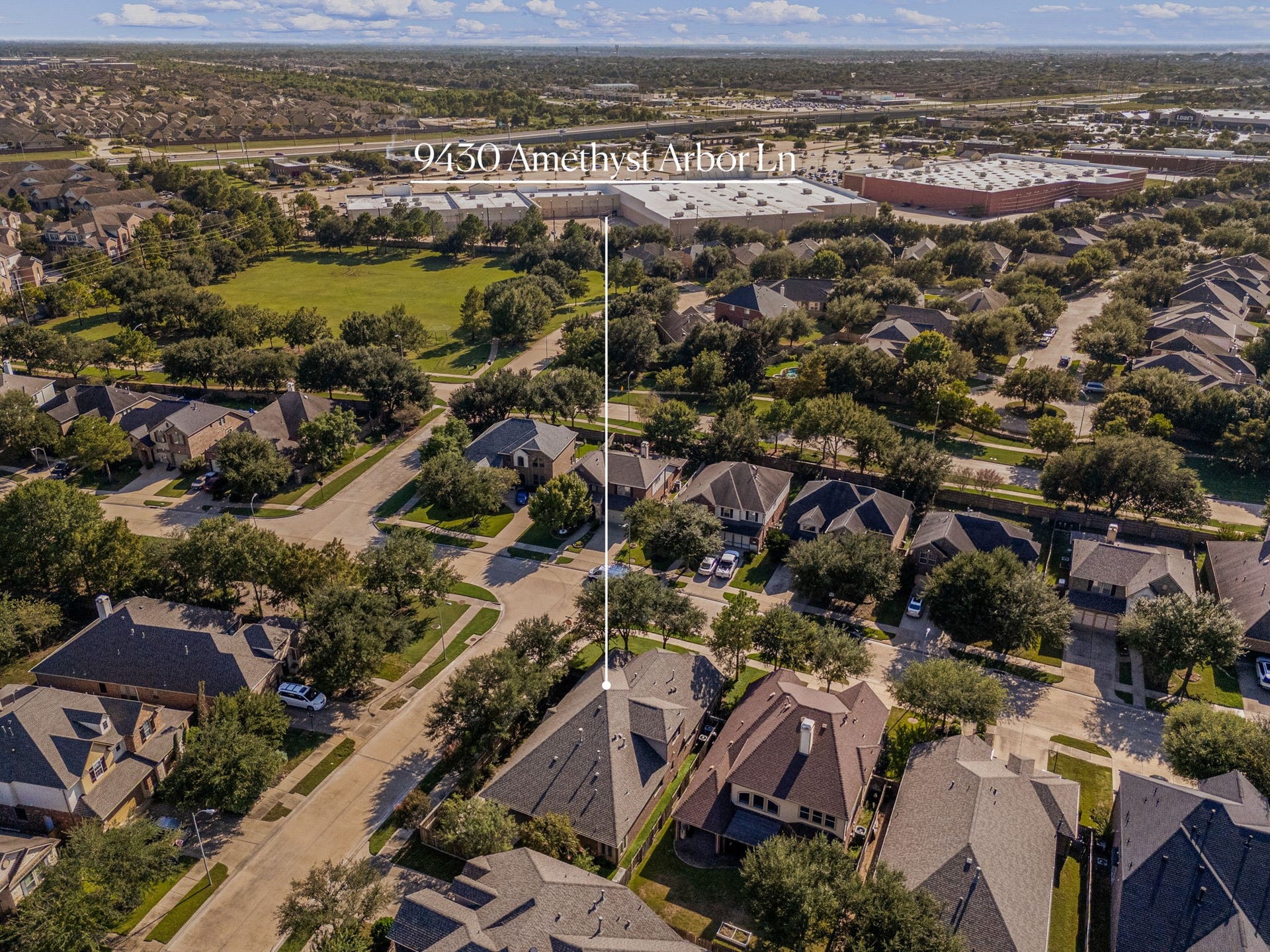 9430 Amethyst Arbor Lane, Katy, TX 77494 This spectacular aerial view perfectly captures the prime positioning of the home within the highly desirable Cinco Ranch Southwest master-planned community.