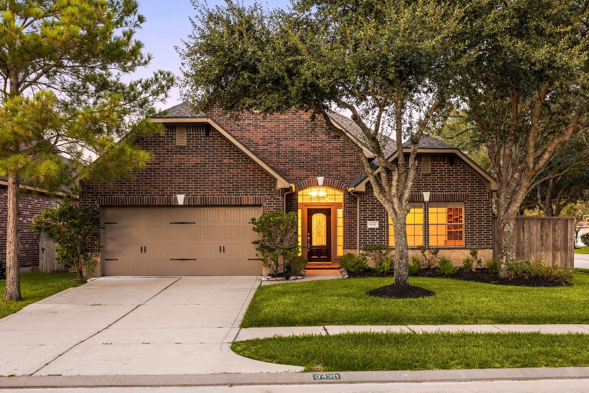 9430 Amethyst Arbor Lane, Katy, TX 77494 Welcome home to 9430 Amethyst Arbor lane located on corner lot in Cinco Ranch Southwest and zoned to Katy ISD! This stunning home has lovely curb appeal, a well-manicured lawn, beautiful landscaping, dark stained front door with glass detailing, covered front porch, traditional style, and a double wide driveway!