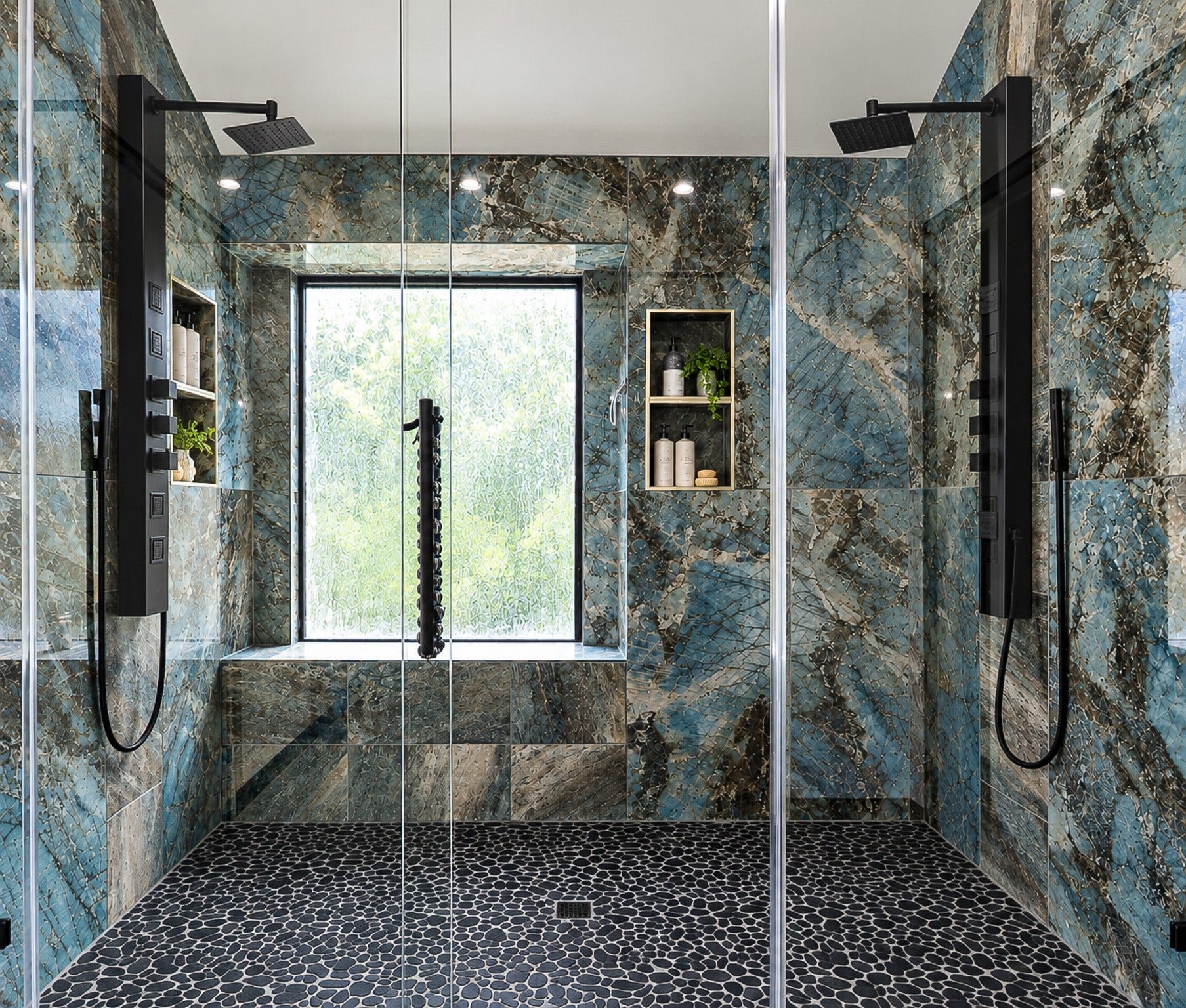 435 Sandstone Creek Lane, Dickinson, TX 77539 Primary bathroom shower. Double shower heads.