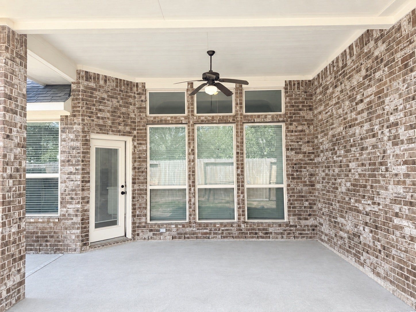 Inviting backyard patio provides a wonderful setting for outdoor dining, weekend gatherings, or simply relaxing and enjoying the outdoors.