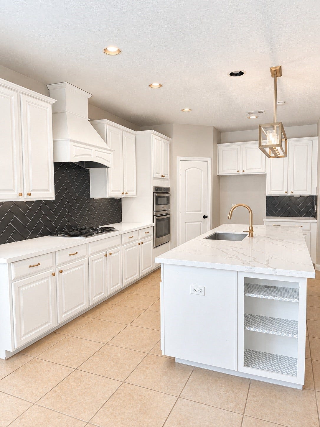 Another view of the kitchen from the breakfast area