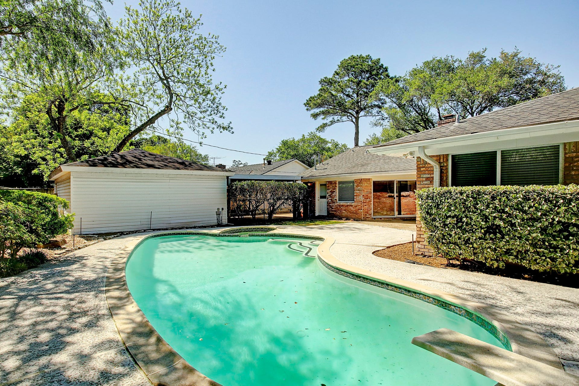 Good looks, deep roots. Classic brick, beautiful landscaping, and mature trees welcome you to this Parkwest lease, just blocks from Parker Elementary.