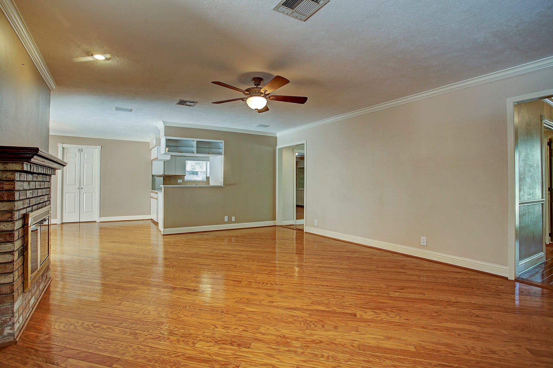 Room to arrange furniture around how you actually live, with easy connections to the kitchen, entry, and backyard.