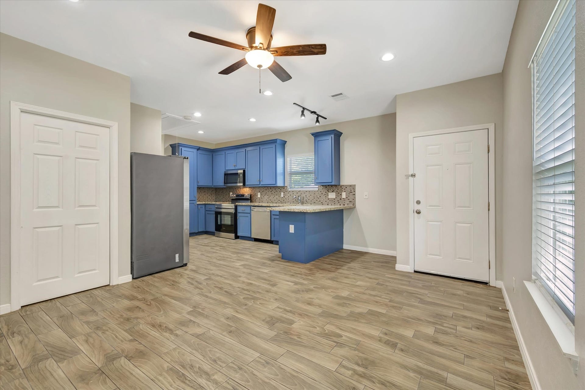 View of Kitchen and Front Entry from the Loving Room