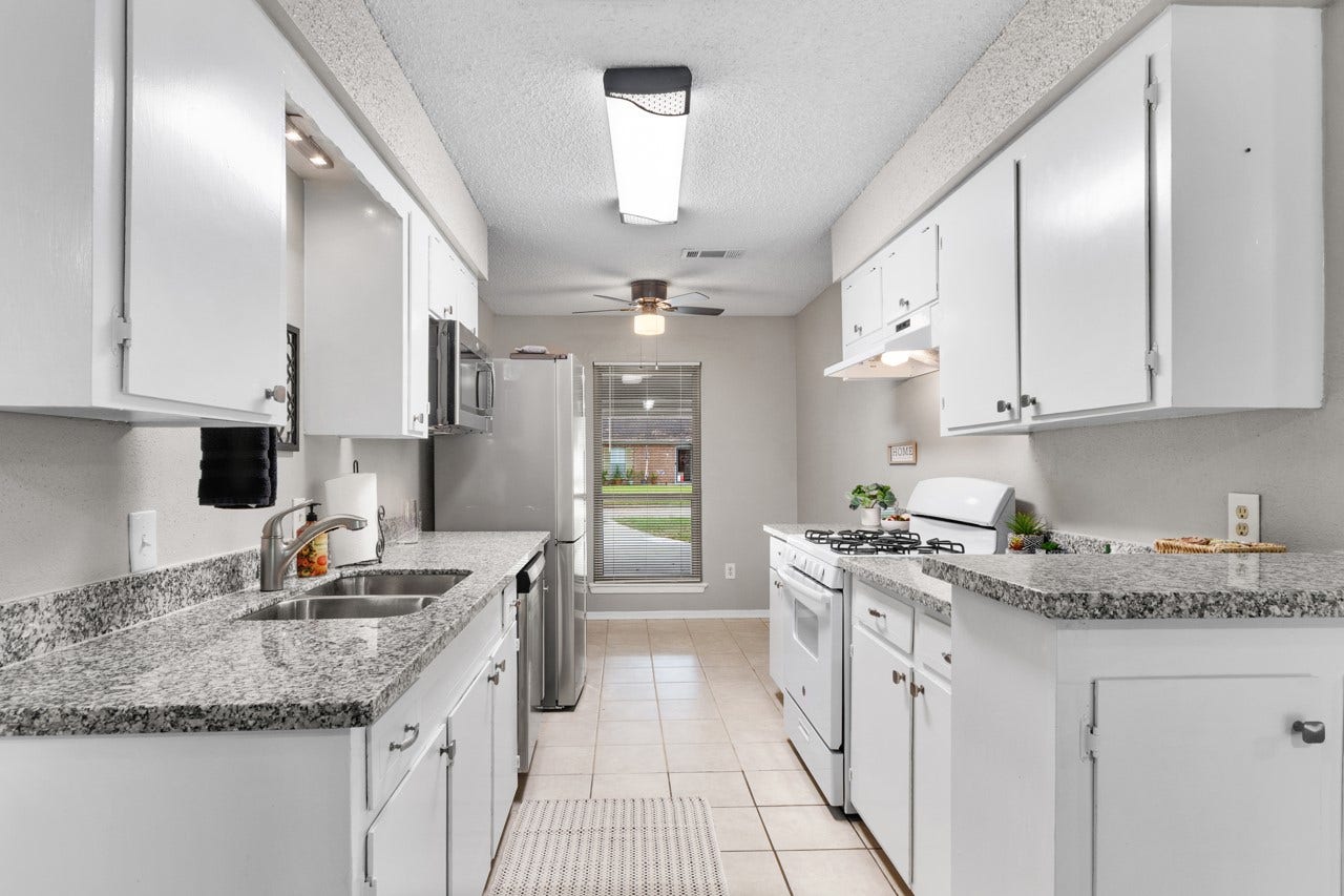 745 Dezso Drive, Alvin, TX 77511 Cute, updated galley kitchen.
