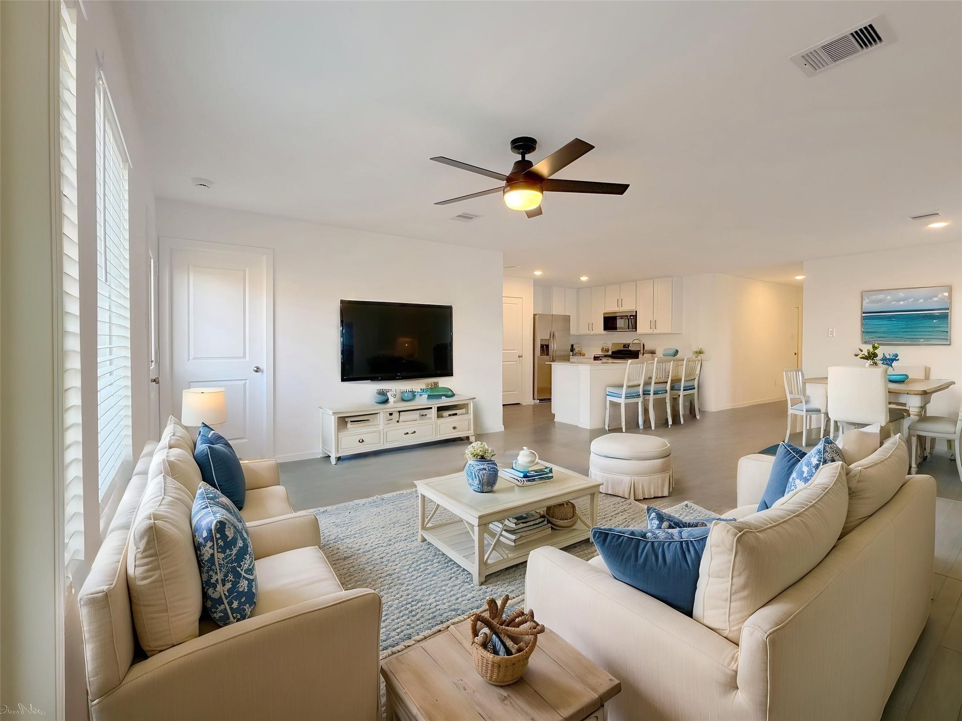 18815 Ribolla Drive, New Caney, TX 77357 Open living & dining areas...this photo is virtually staged