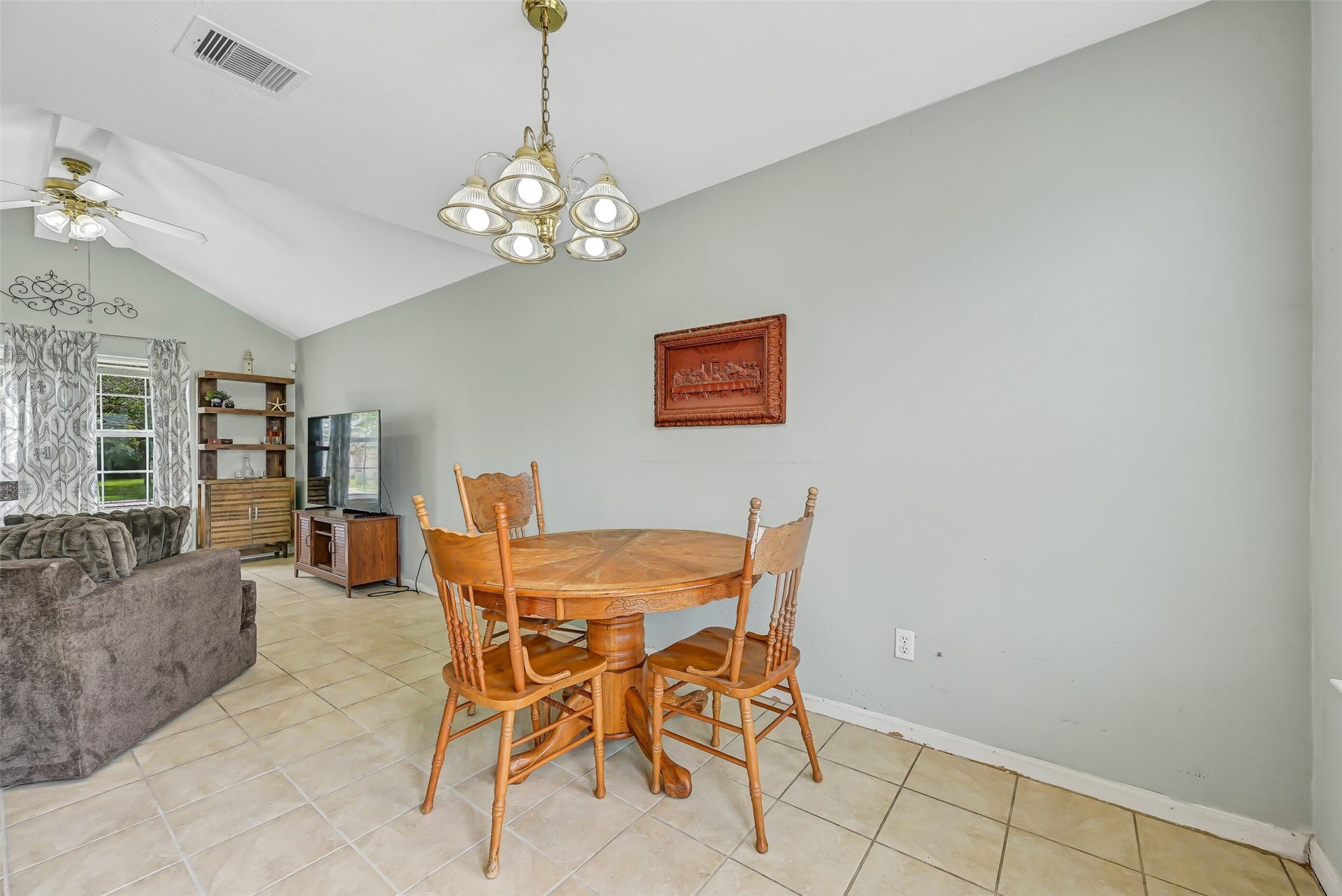 9022 Amberjack Drive, Texas City, TX 77591 The dining area sits between the family room and kitchen, creating an easy, open flow for meals and gatherings while maintaining plenty of room for a full-size dining table.
