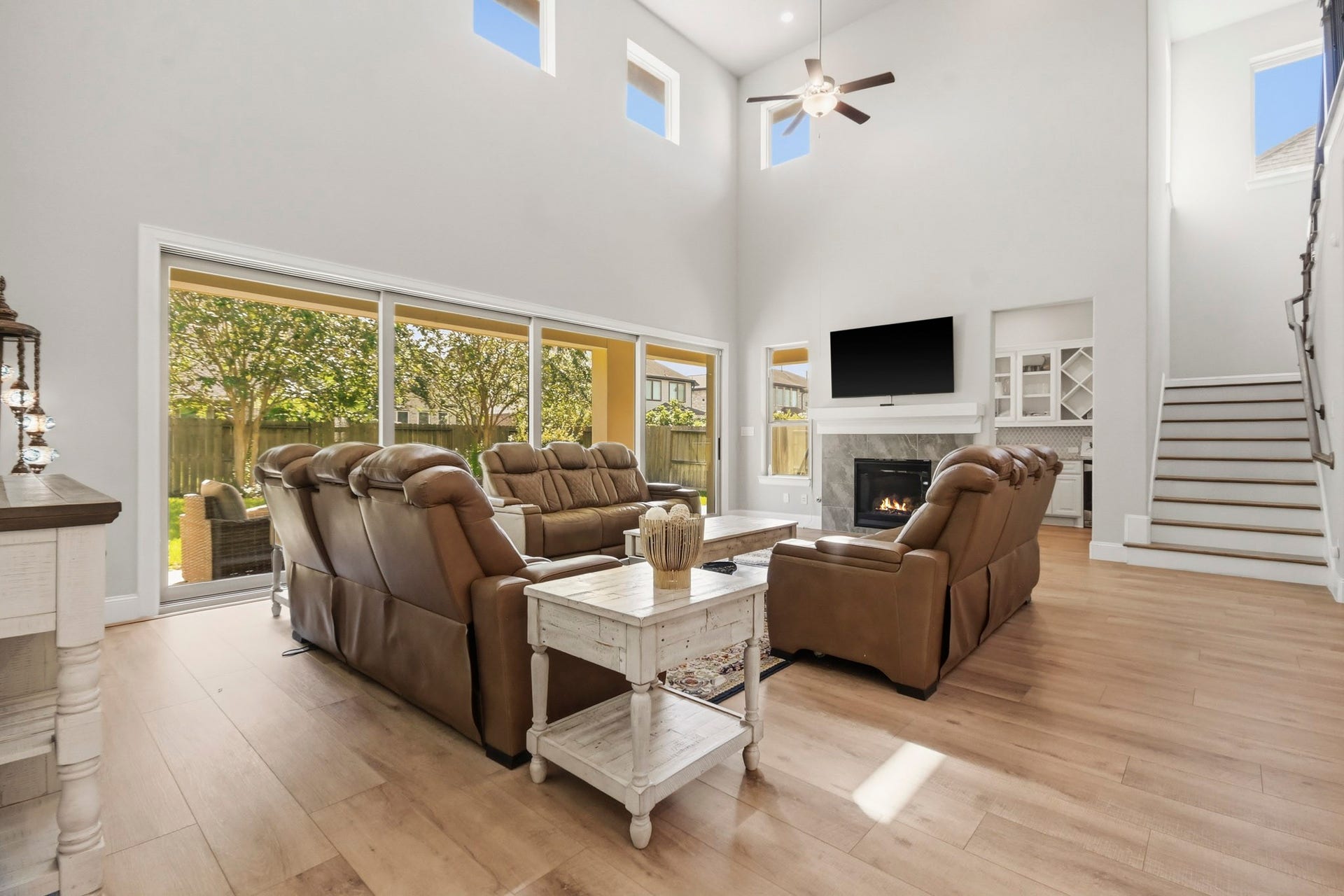 2511 Park Square Drive, Missouri City, TX 77459 Bright living room with large windows and easy access to the covered patio.