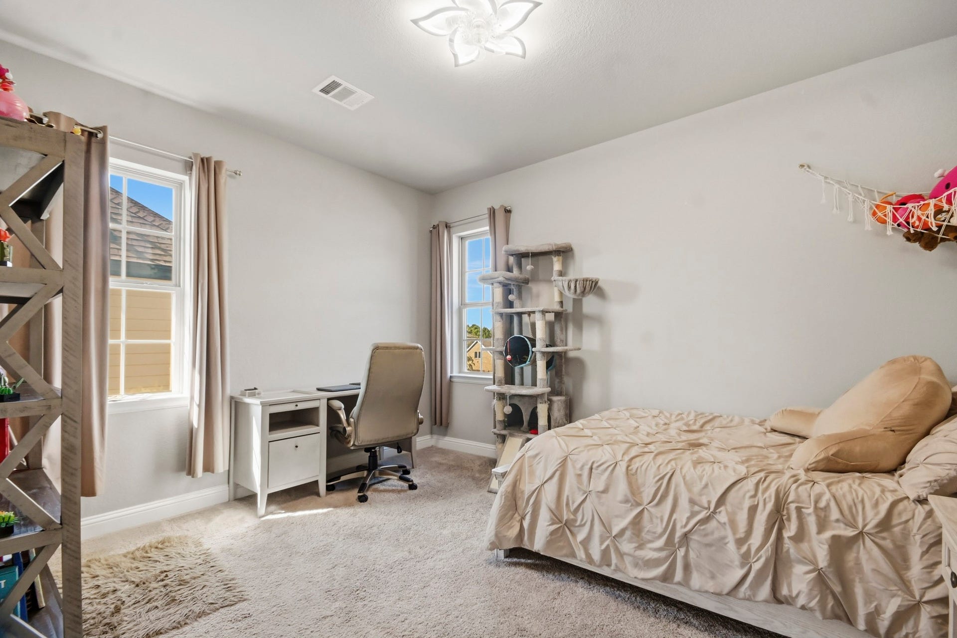 2511 Park Square Drive, Missouri City, TX 77459 Another spacious bedroom offers flexibility for family, guests, or a home office.