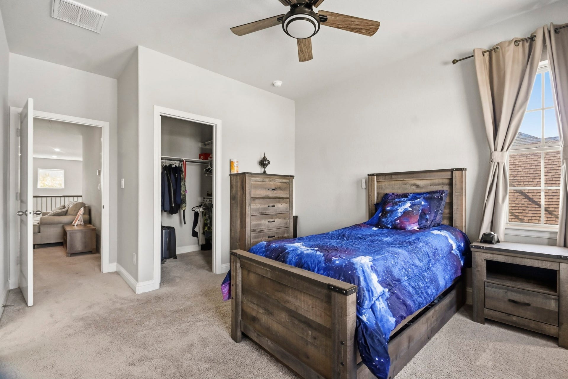 2511 Park Square Drive, Missouri City, TX 77459 Spacious secondary bedroom with ample natural light and closet space.