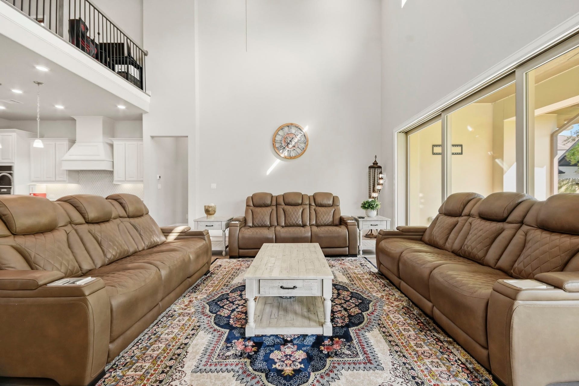 2511 Park Square Drive, Missouri City, TX 77459 Dramatic two-story living room with soaring ceilings and abundant natural light.