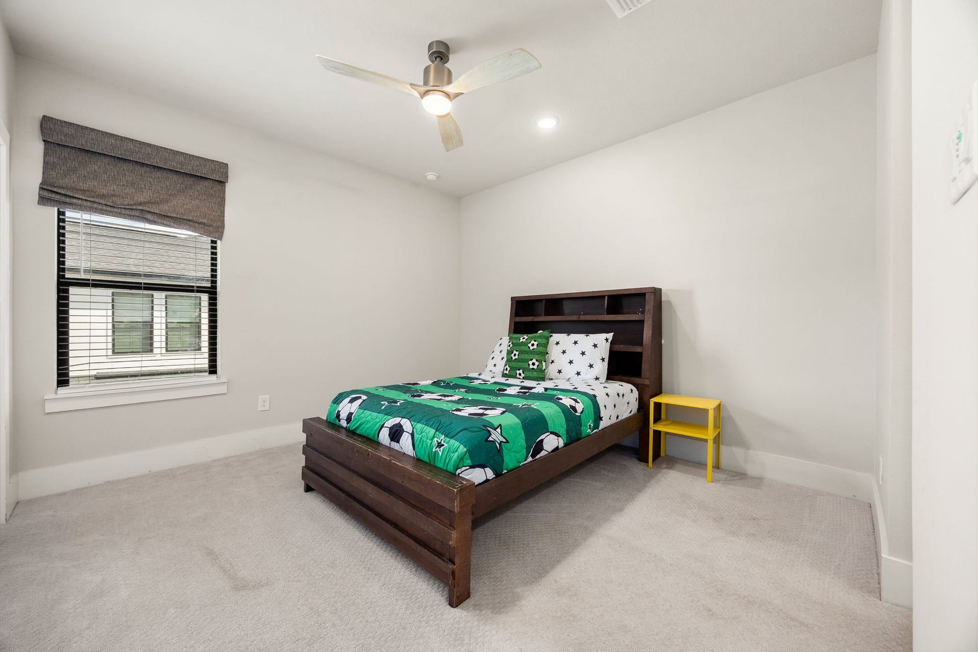 27927 Indigo Ridge Drive, Fulshear, TX 77441 Comfortable secondary bedroom featuring a ceiling fan and neutral finishes.
