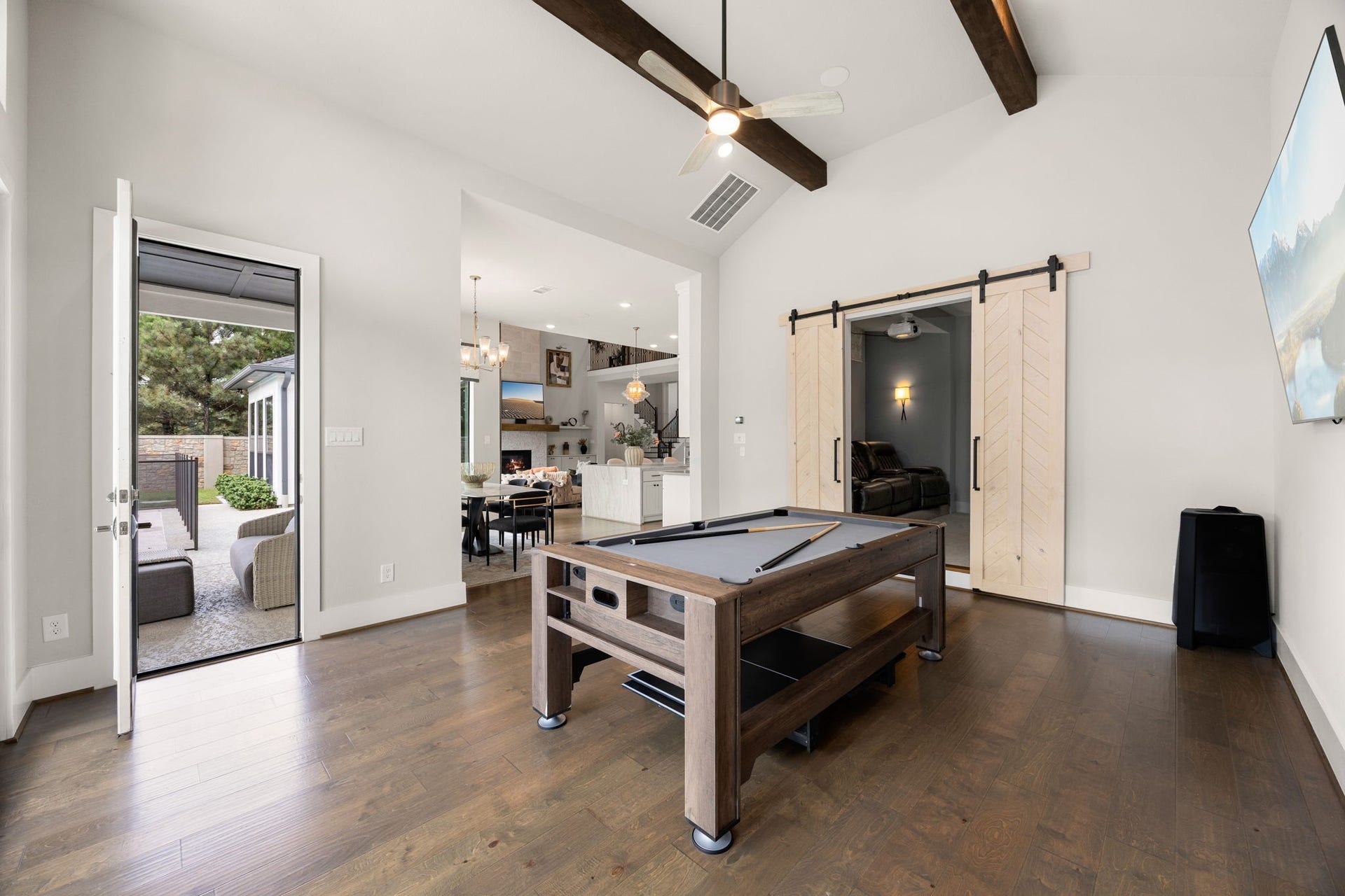 27927 Indigo Ridge Drive, Fulshear, TX 77441 Versatile game room offering generous space for a pool table, games, or a secondary entertainment area.