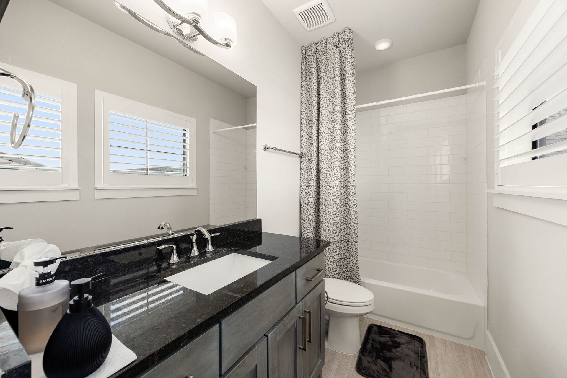 27927 Indigo Ridge Drive, Fulshear, TX 77441 Beautiful secondary bathroom featuring a spacious vanity, updated-style finishes, and plenty of natural light.