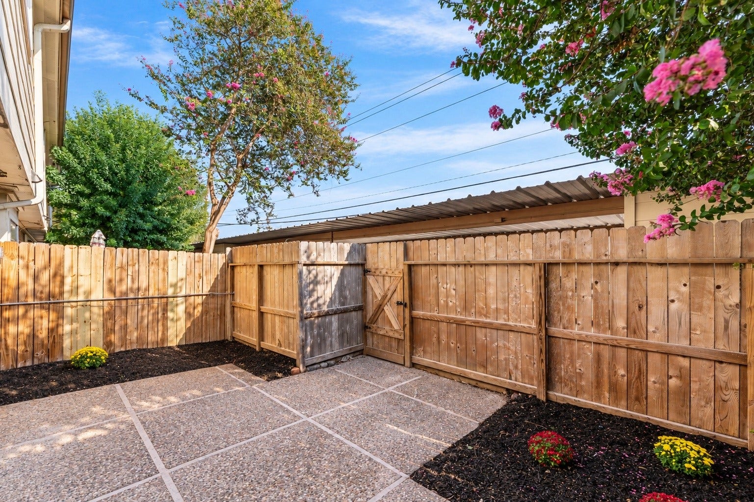 14387 Misty Meadow Lane, Houston, TX 77079 The patio has had a new door and fresh landscaping.