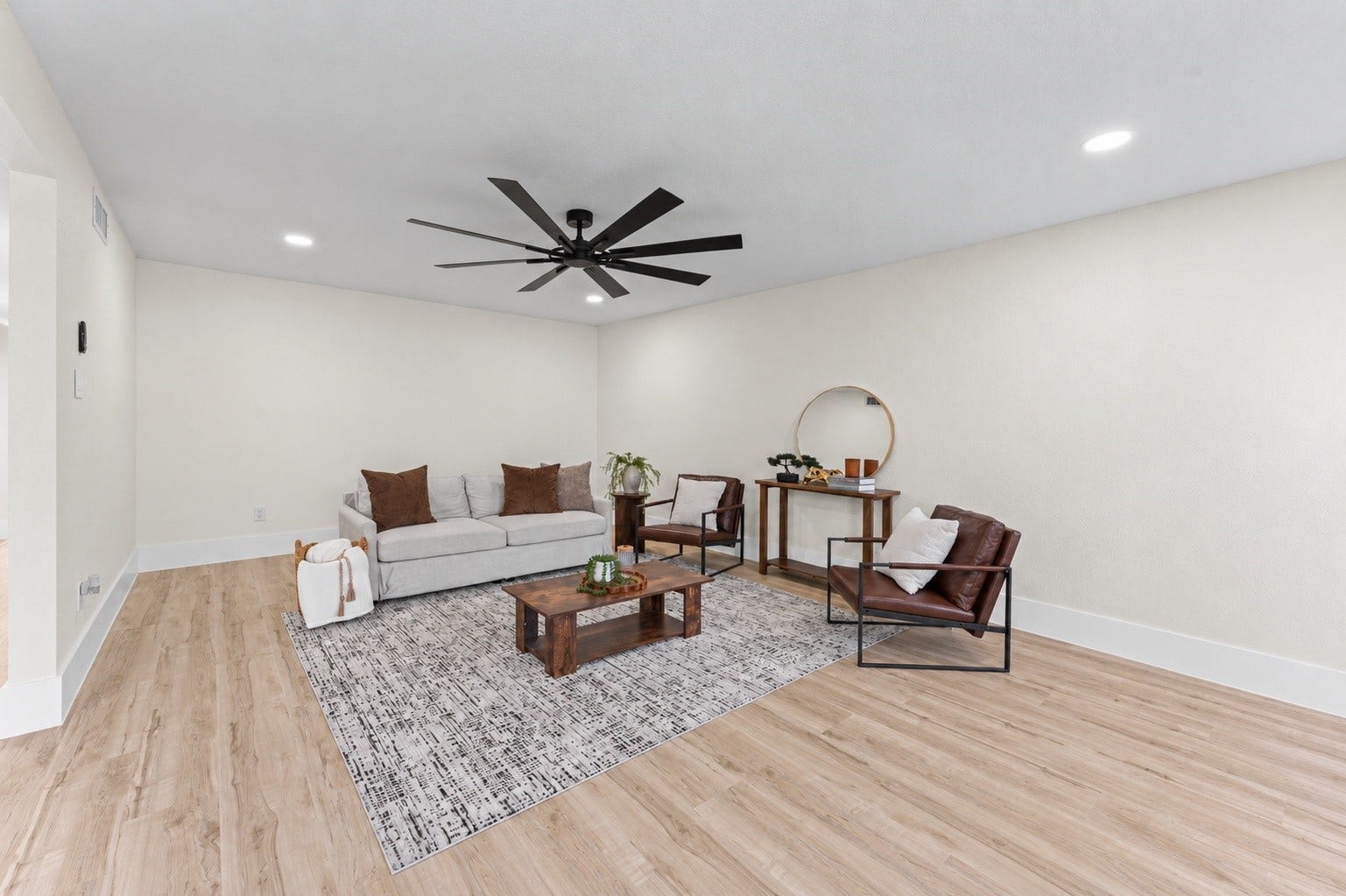 14387 Misty Meadow Lane, Houston, TX 77079 The living room has a brand new fan!