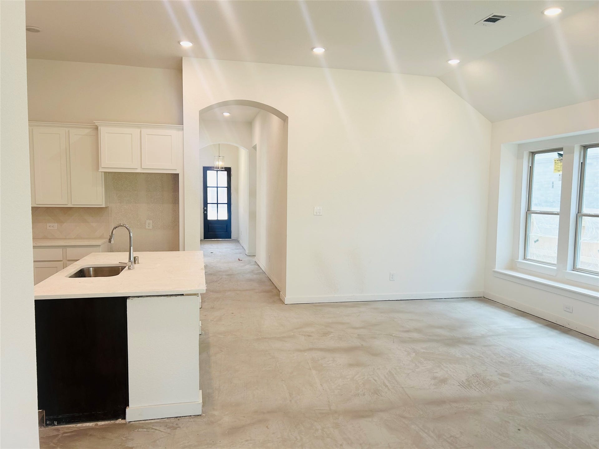 2730 Pathway Crest Lane, Webster, TX 77598 Step into a bright, seamlessly connected heart of the home.