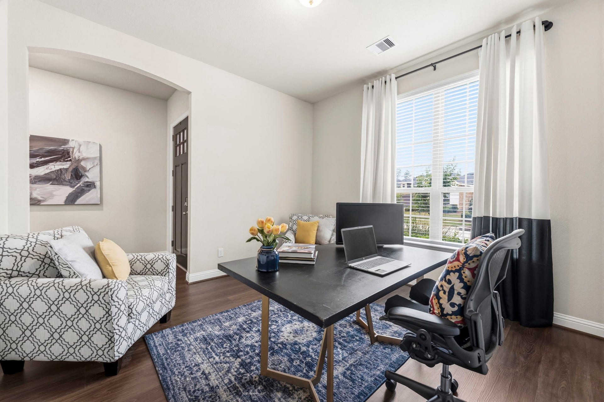 17209 Olive Blossom Court, Conroe, TX 77385 Dedicated study just off the entry with a large front-facing window and plenty of natural lightideal for a home office or flex space.