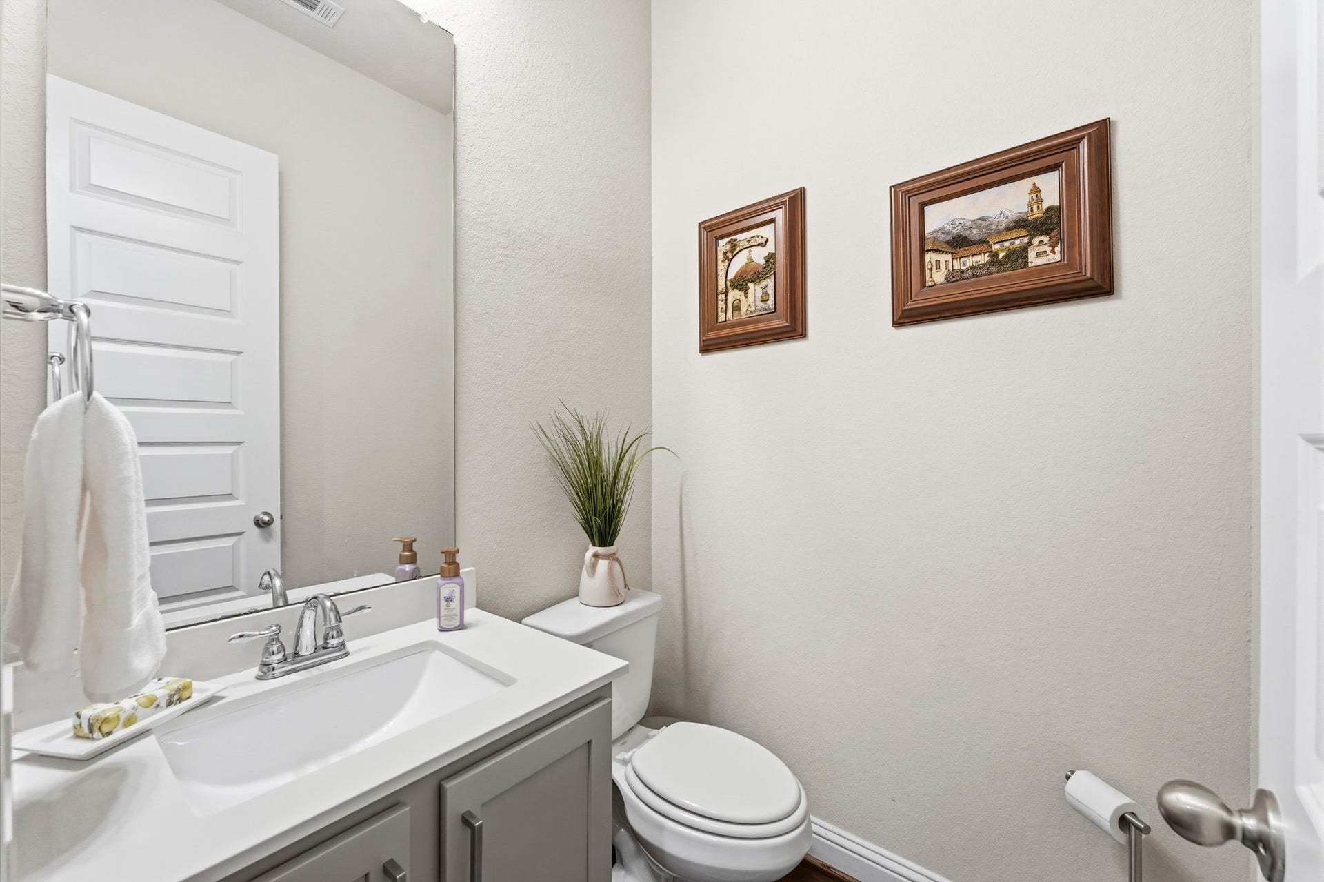17209 Olive Blossom Court, Conroe, TX 77385 Well-placed downstairs half bath, conveniently located for guests.