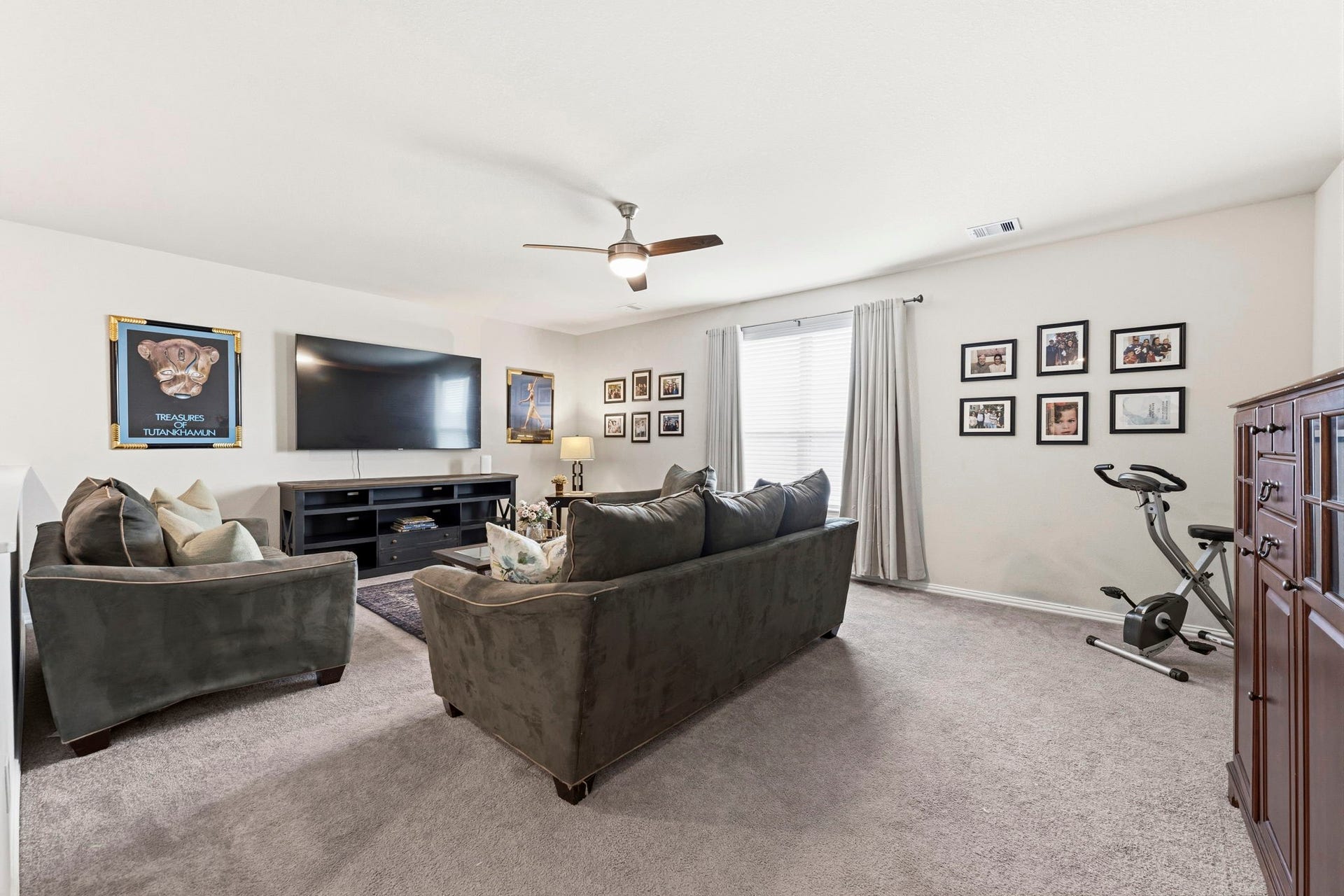 17209 Olive Blossom Court, Conroe, TX 77385 Spacious upstairs game room offering a flexible layout for a variety of uses, from a second living area to a workout or play space.