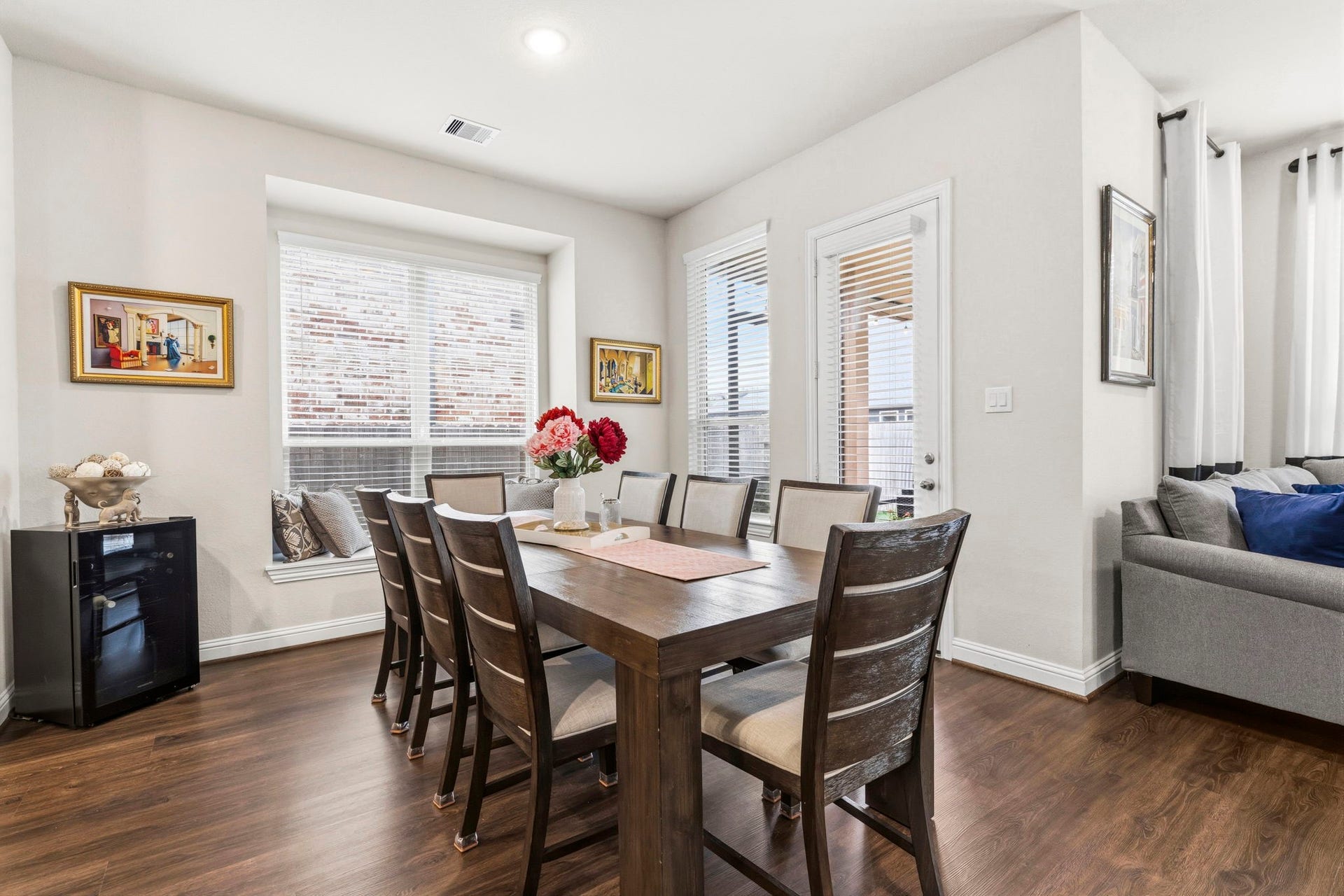 17209 Olive Blossom Court, Conroe, TX 77385 Spacious dining area open to the kitchen and family room, creating an inviting setting for everyday living and effortless entertaining.