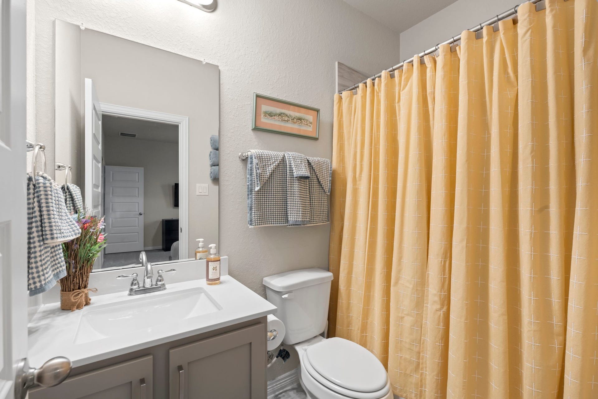 17209 Olive Blossom Court, Conroe, TX 77385 Private en-suite bathroom for this secondary bedroom.