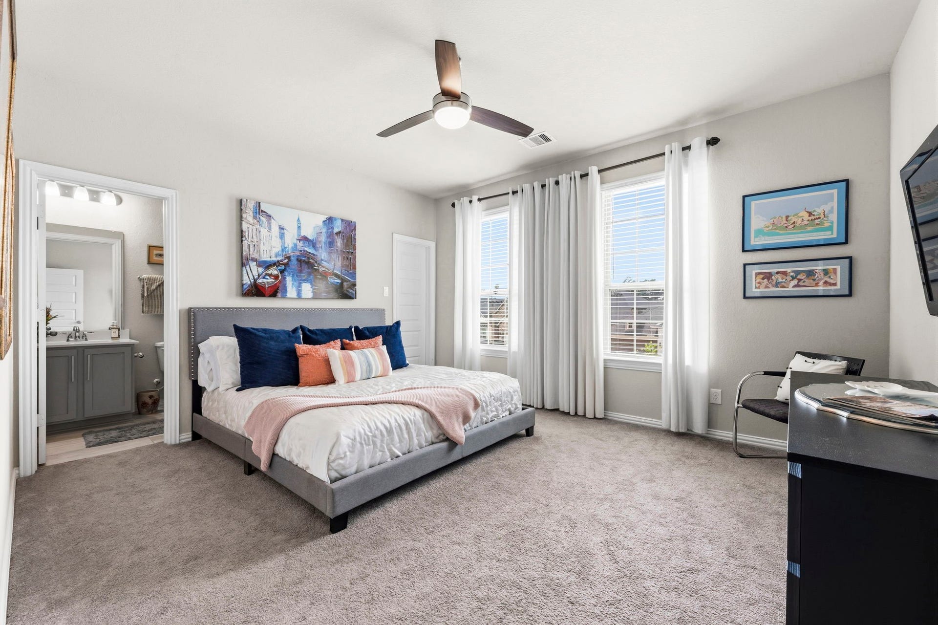 17209 Olive Blossom Court, Conroe, TX 77385 Spacious secondary bedroom with large walk-in closet and private en-suite bath, offering comfort and privacy.