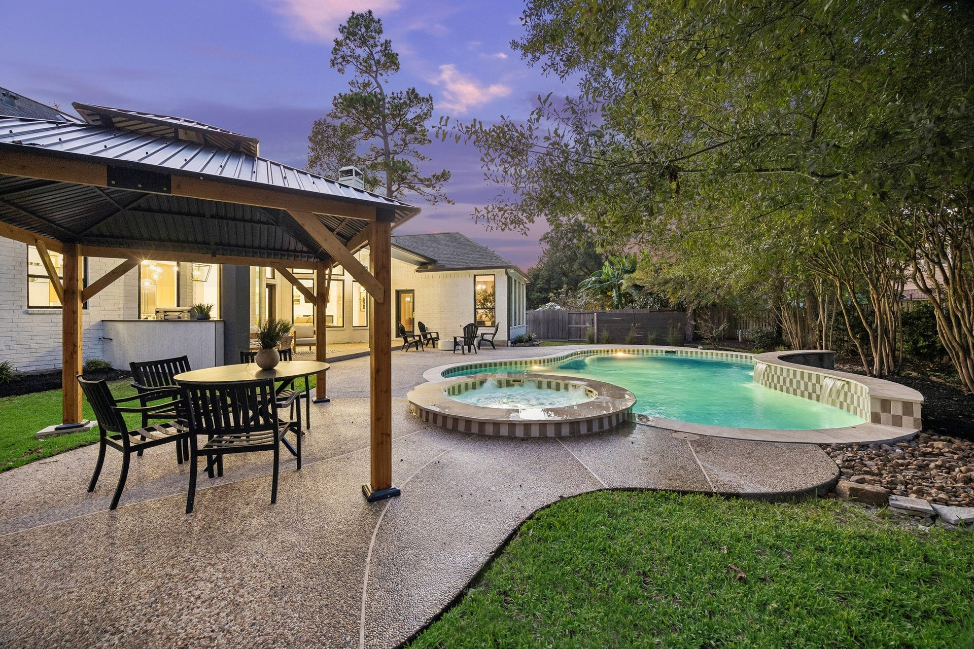 34 N Lansdowne Circle, The Woodlands, TX 77382 A pergola offers shade during the hot summer months