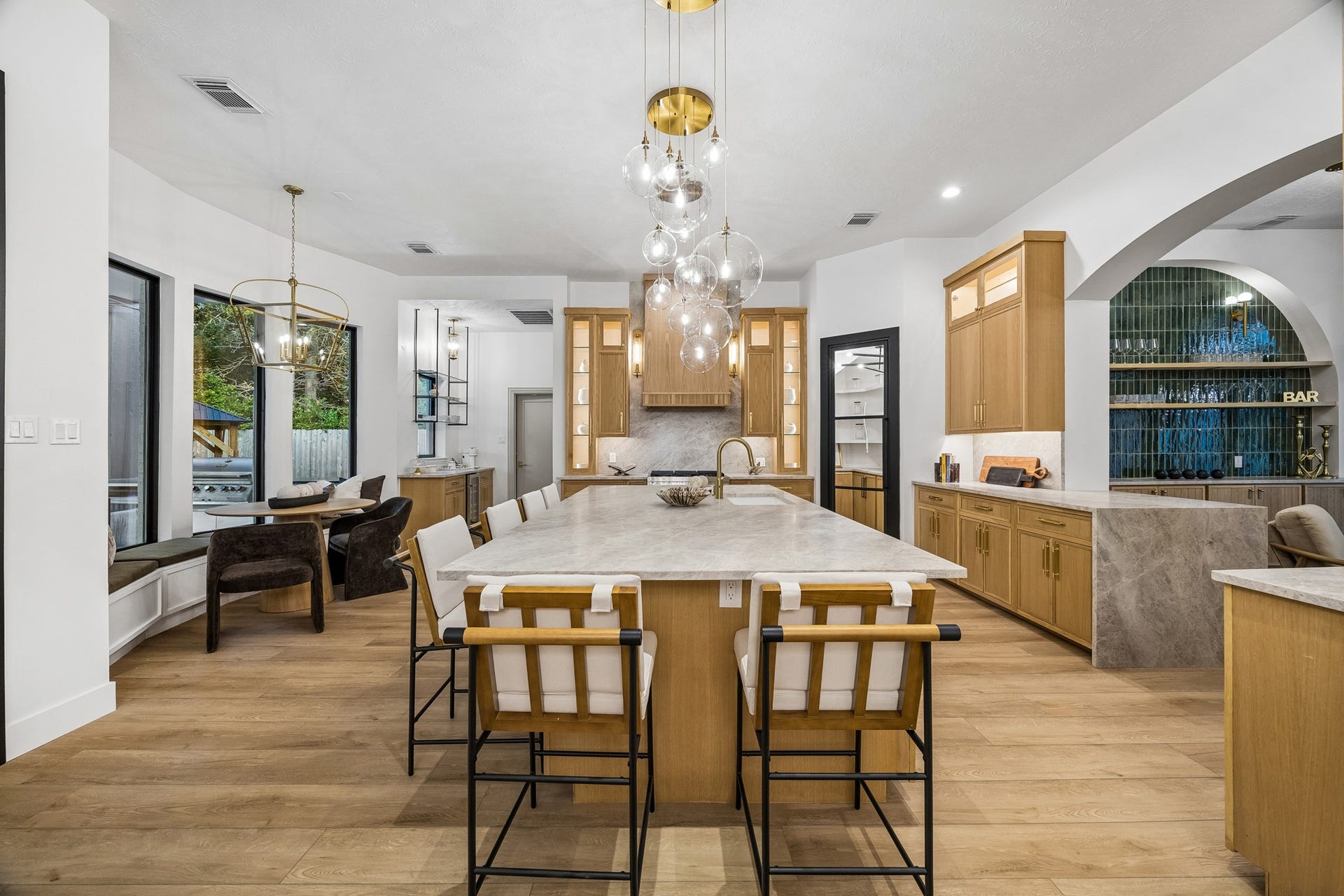 34 N Lansdowne Circle, The Woodlands, TX 77382 Your view from the range while cooking dinner