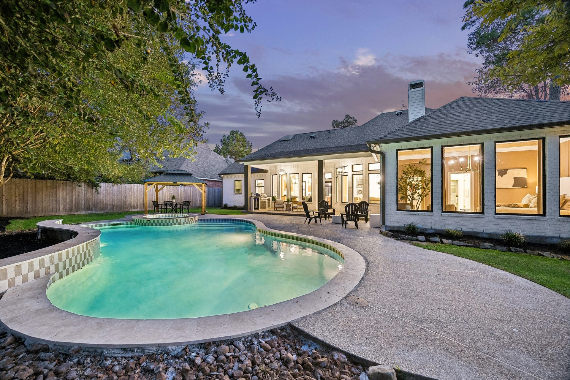 34 N Lansdowne Circle, The Woodlands, TX 77382 Backyard Oasis with brand new tile on the pool