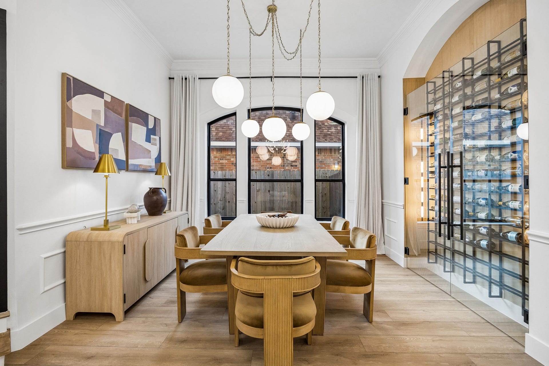 34 N Lansdowne Circle, The Woodlands, TX 77382 Your dining space features a built-in wine storage room
