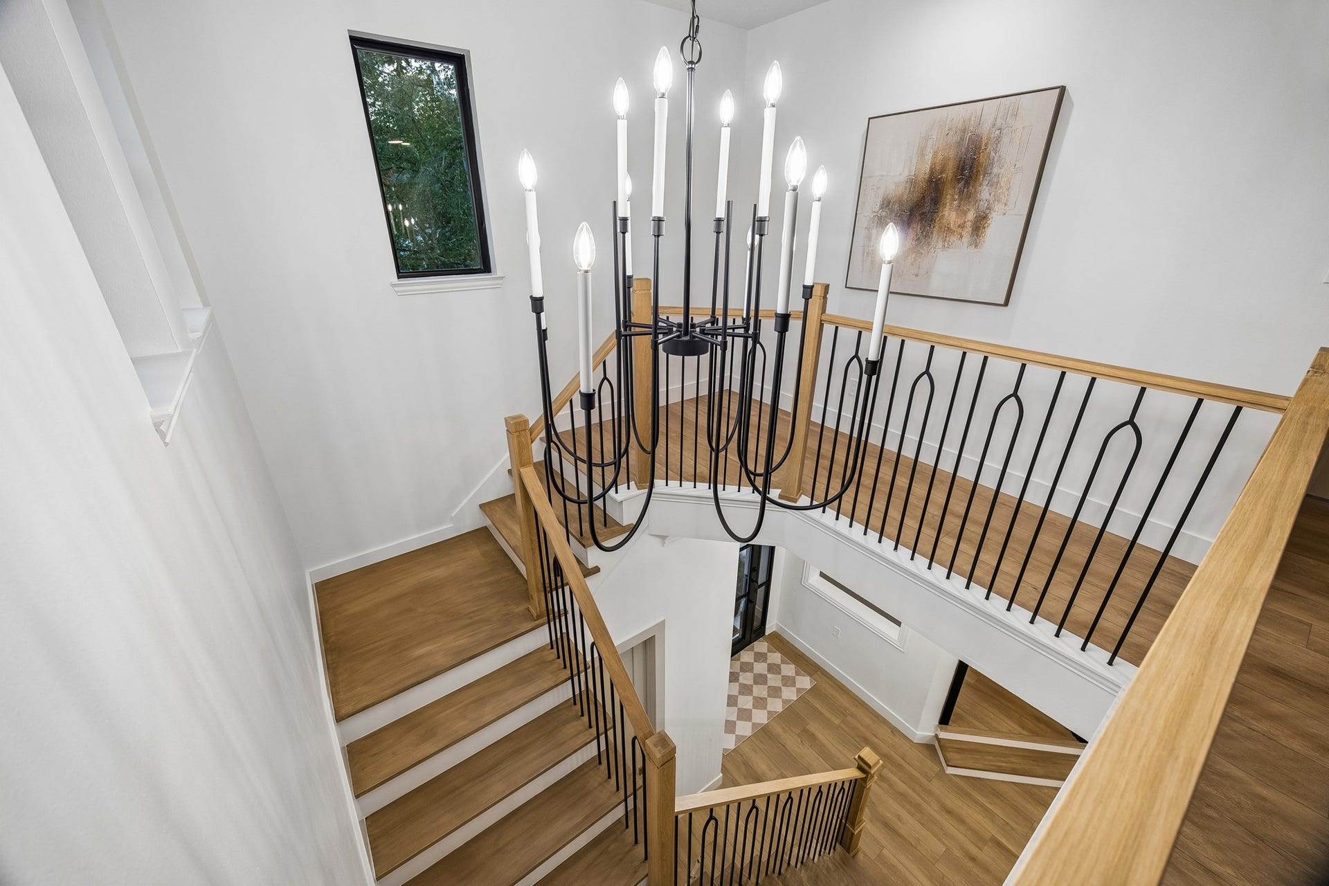34 N Lansdowne Circle, The Woodlands, TX 77382 Your view down the main stairwell