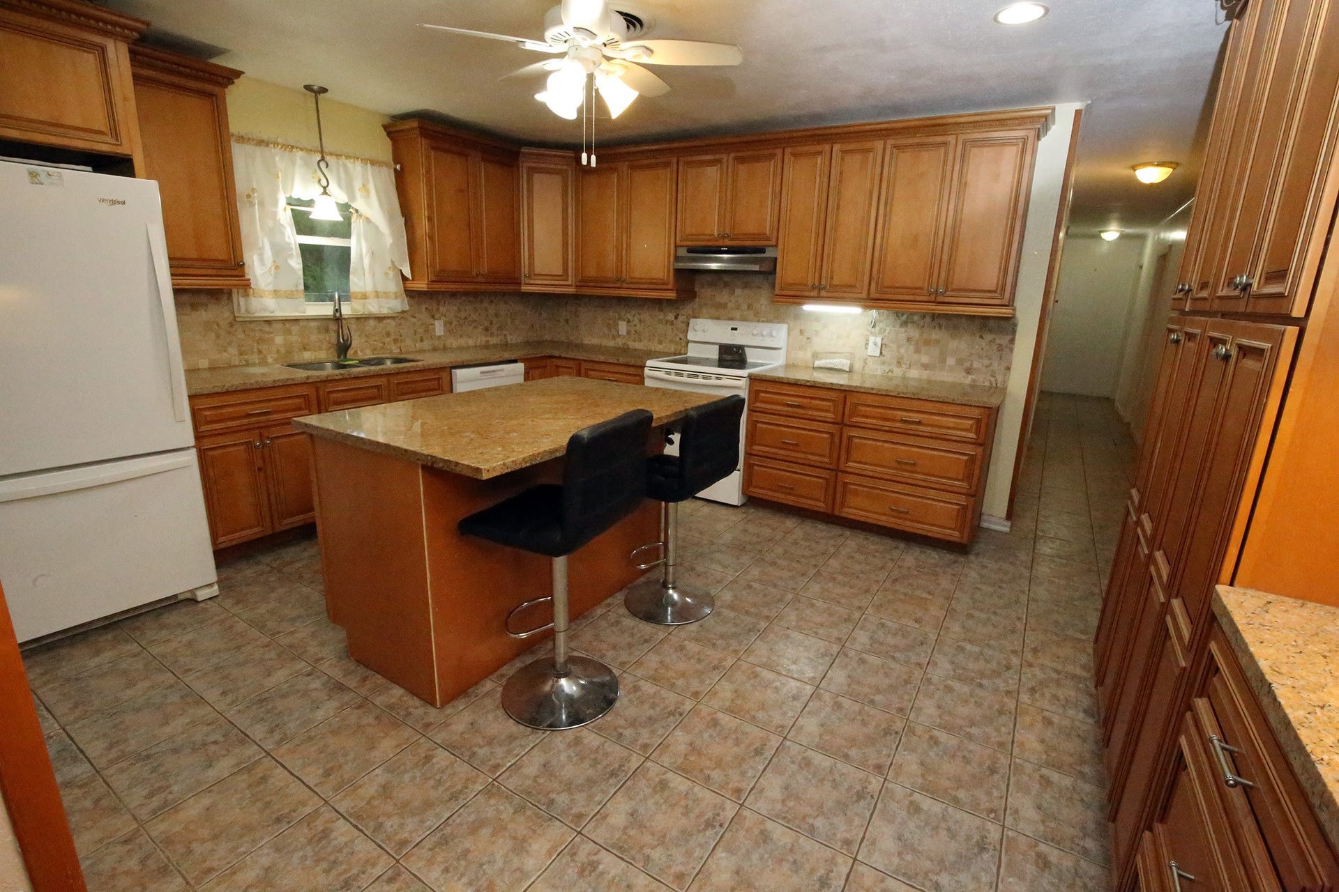 4929 S Elm Avenue, Santa Fe, TX 77517 The kitchen is big and the refirgerator stays with the home!