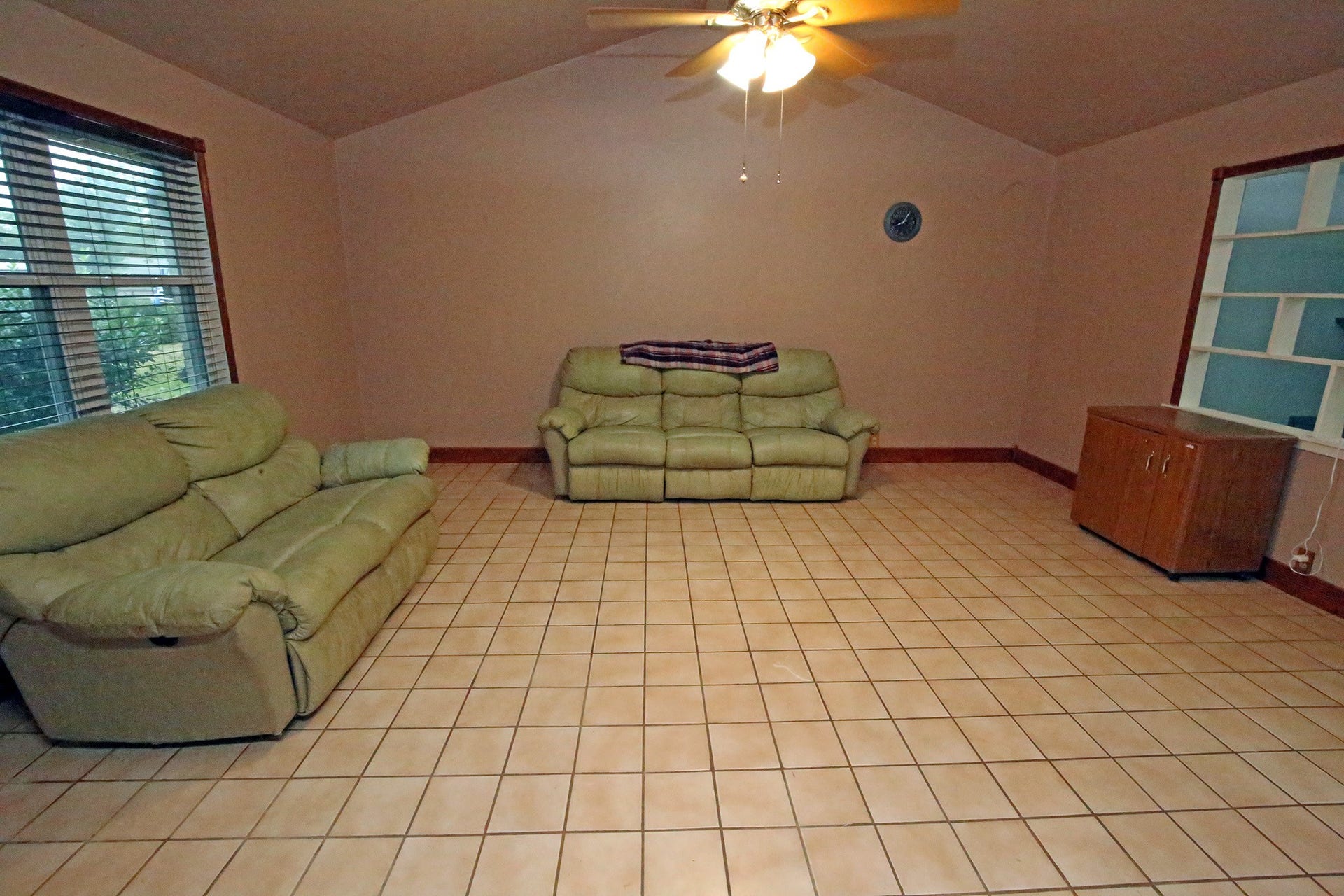 4929 S Elm Avenue, Santa Fe, TX 77517 Spacious living room with tile flooring througout!