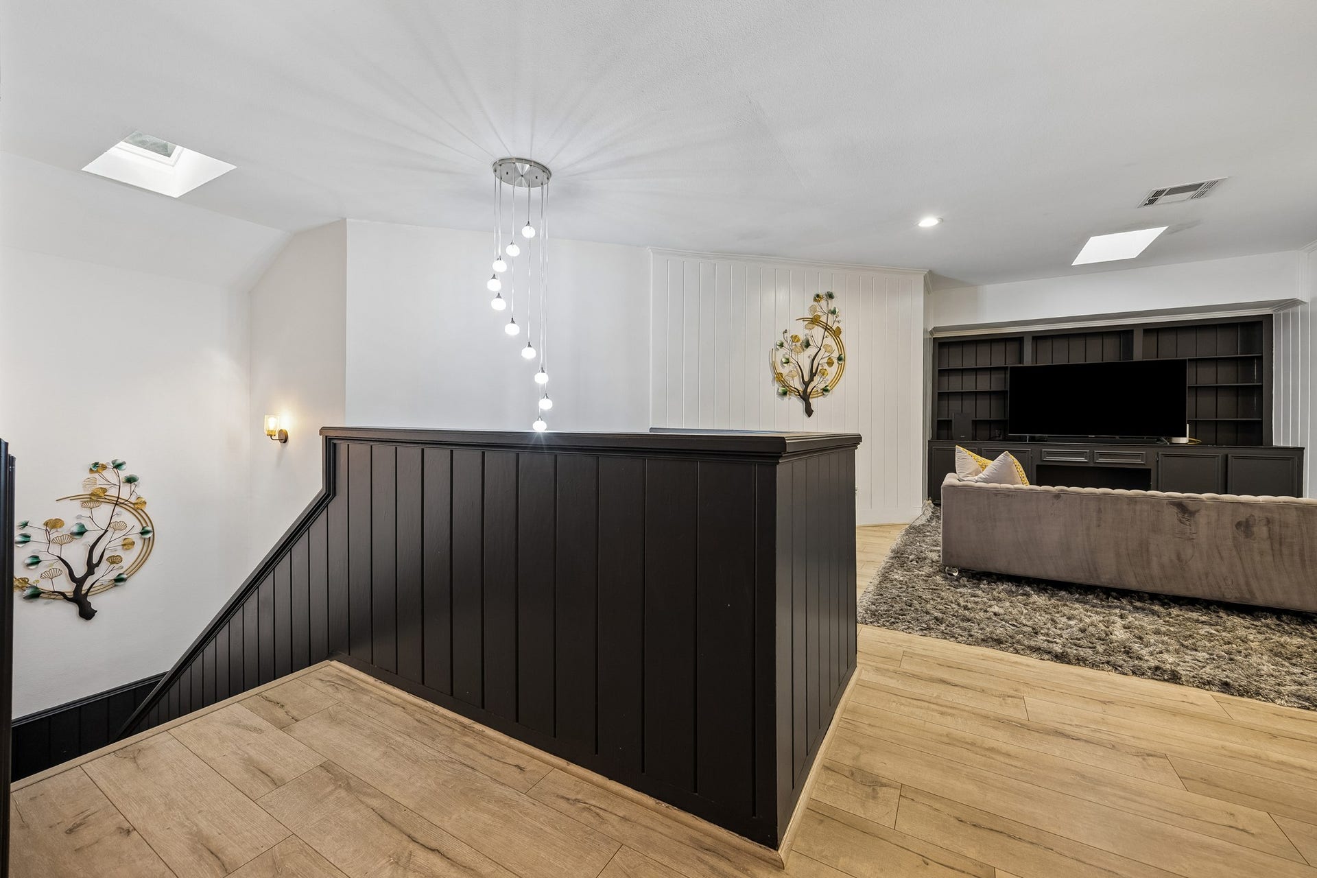 2524 Nantucket Drive, #C, Houston, TX 77057 The second floor features three bedrooms with ensuite baths and entertainment area.