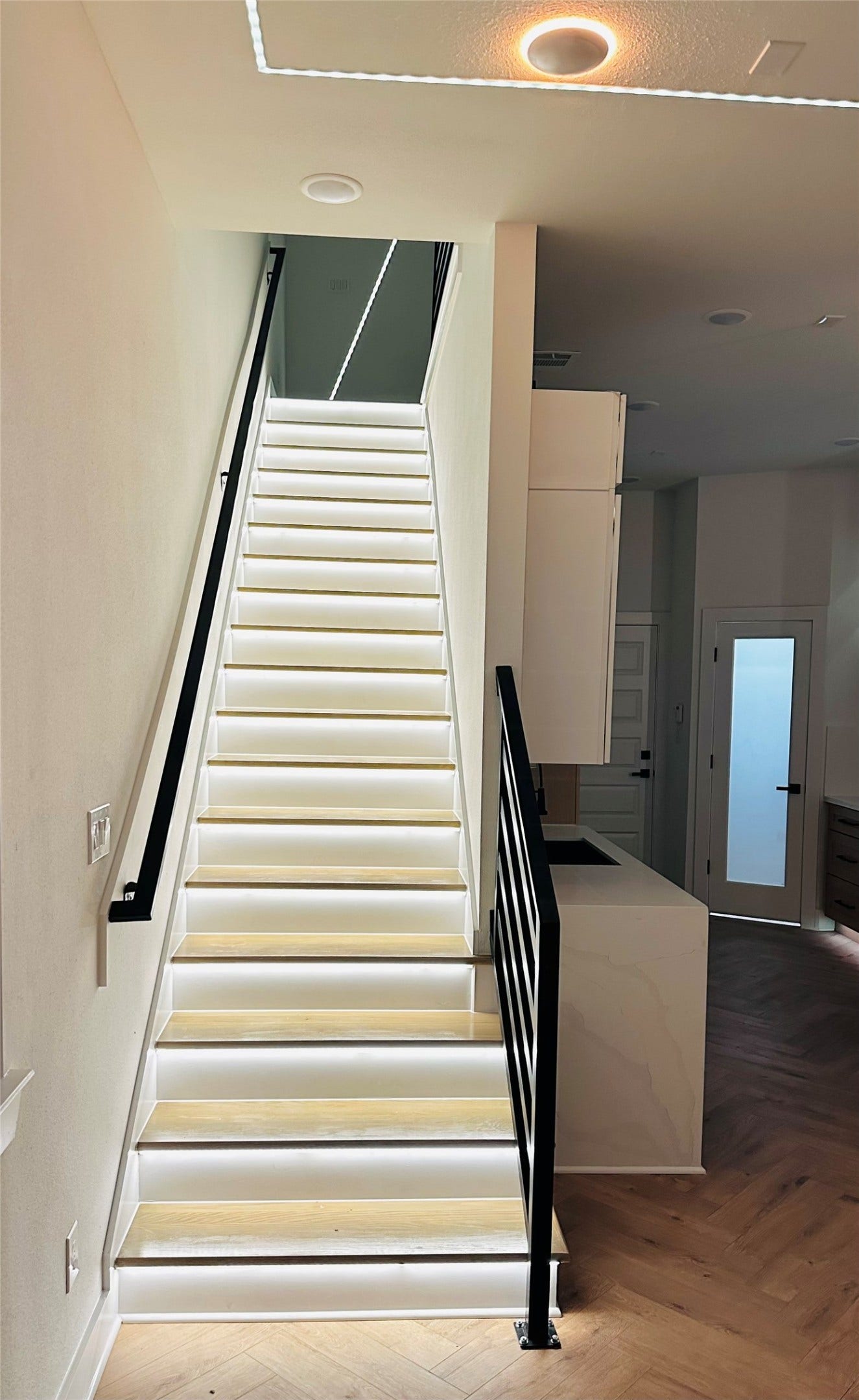 4607 Bricker Street, #A B C, Houston, TX 77051 LED illuminated stairs in unit A & B only. All stairs feature custom made wrought iron stai rails and ballusters