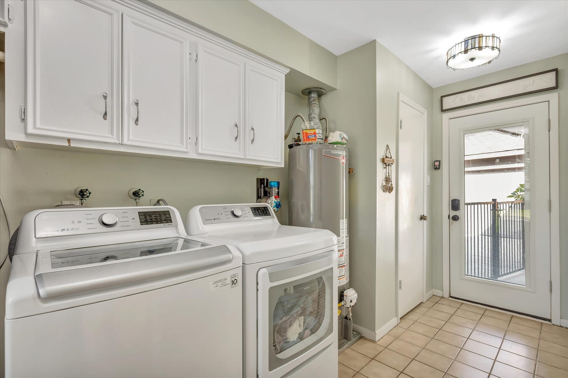 UTILITY ROOM IN HOUSE: WATER HEATER IS DOWNSTAIRS- INSURANCE LIFESAVOR!