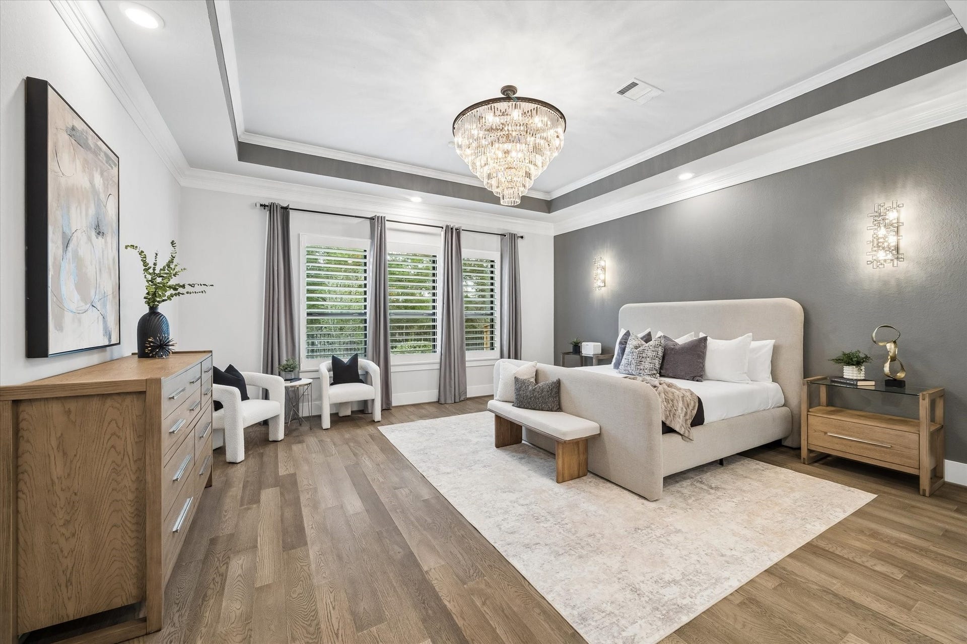 27720 Hazelbrook Lane, Spring, TX 77386 Your massive Primary Suite features vaulted ceilings, upgraded high-end fixtures, plantation shutters & stunning views of mature trees.